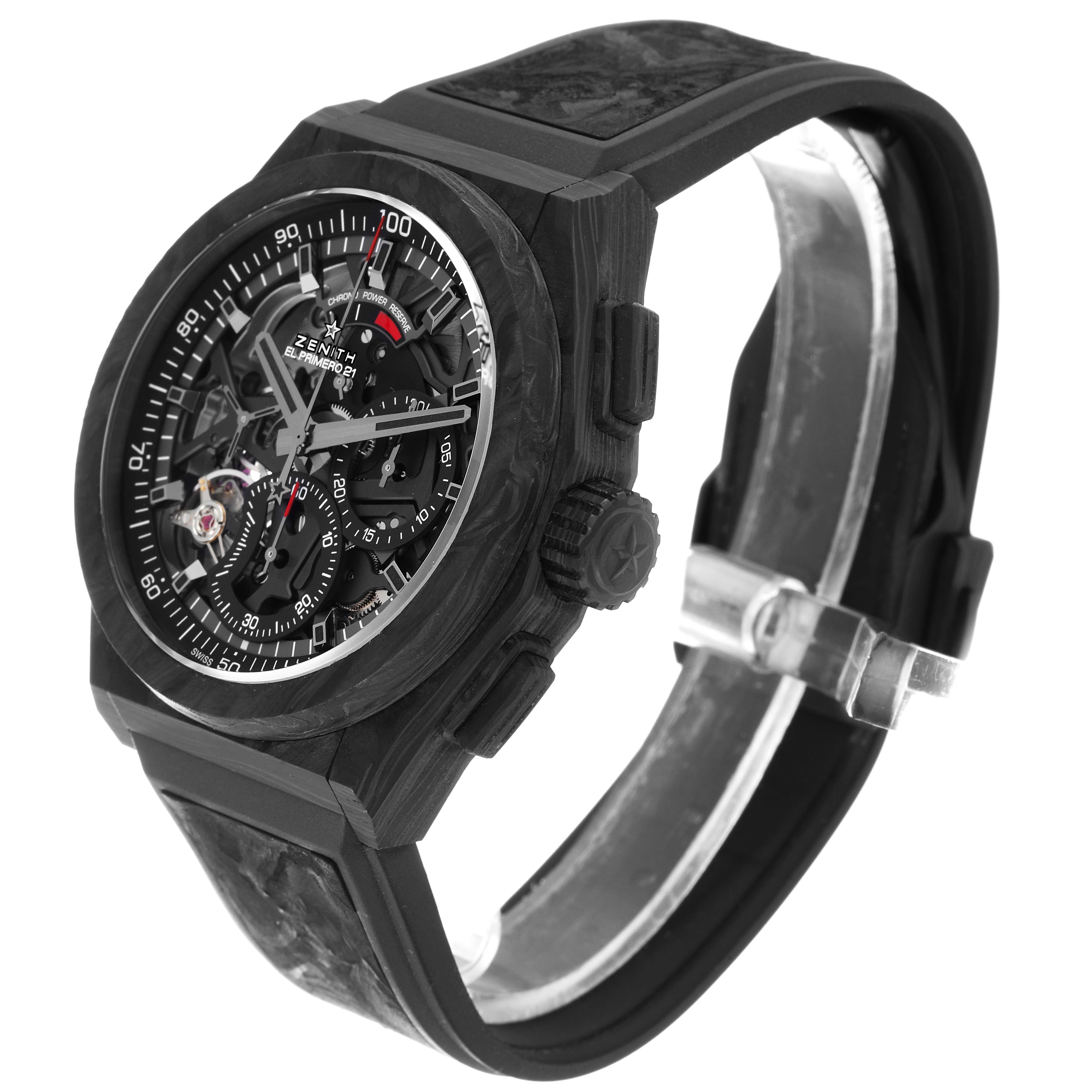 The image shows a Zenith Defy 10.9000.9004/96.R921 Men's Titanium Black Dial 10.9000.9004/96.R921 Men's Titanium Black Dial model watch at a three-quarter view angle, highlighting its face, bezel, and strap.