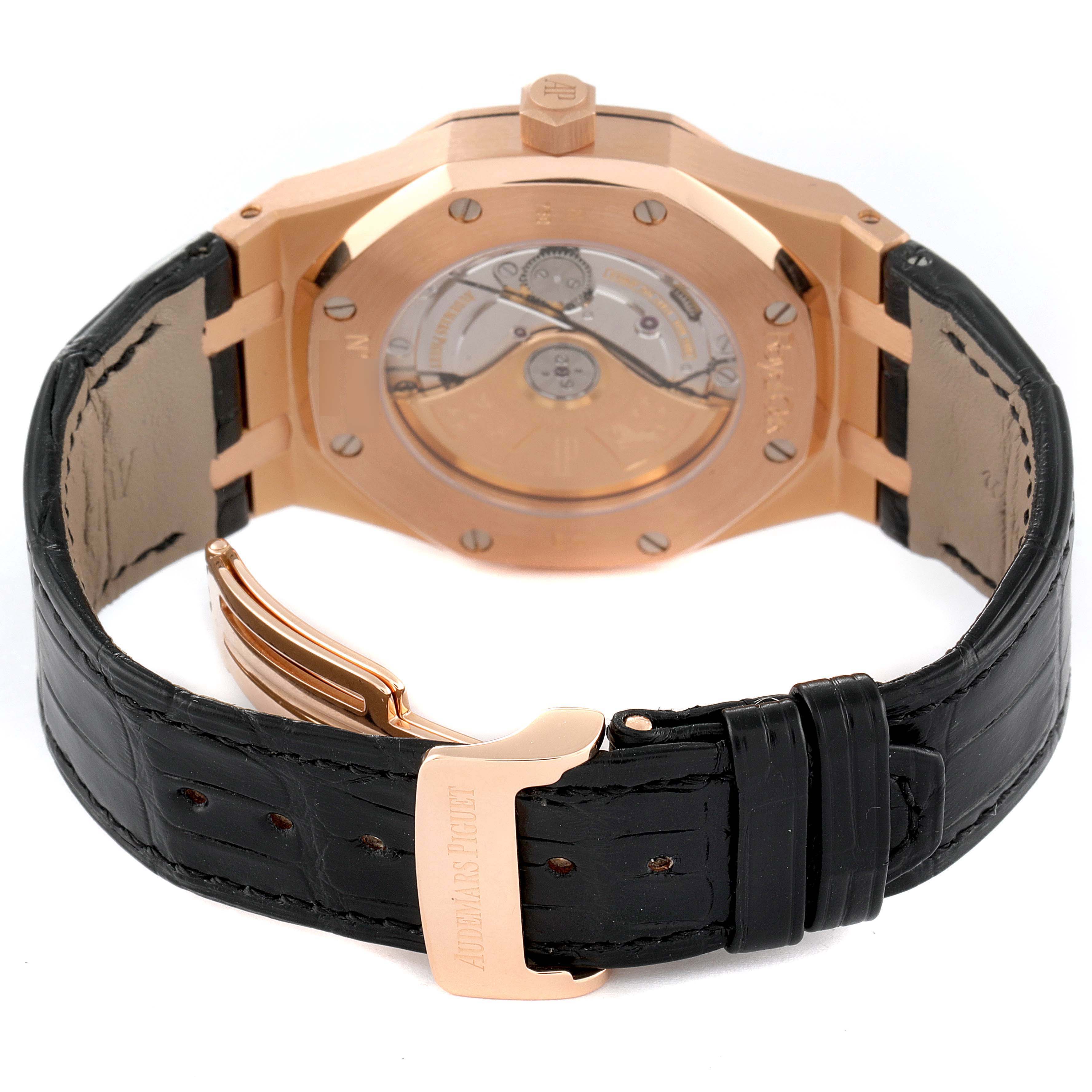 The image shows the back view of the Audemars Piguet Royal Oak 15300OR.OO.D002CR.01 Men's Rose Gold Black Dial 15300OR.OO.D002CR.01 Men's Rose Gold Black Dial watch, highlighting the case back and clasp on the leather strap.