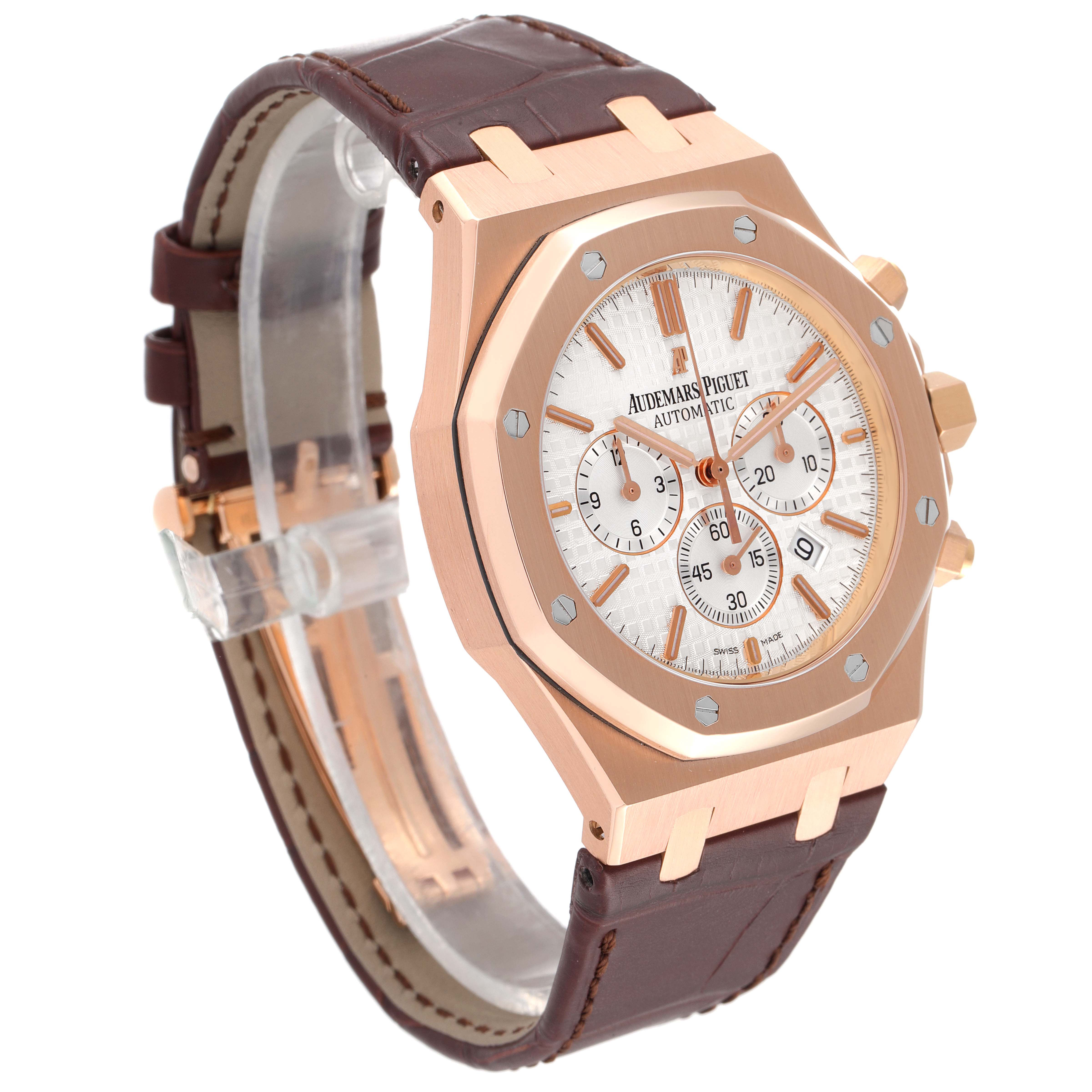 The image shows a side-angled view of a Royal Oak model by Audemars Piguet, highlighting the dial, case, and leather strap.