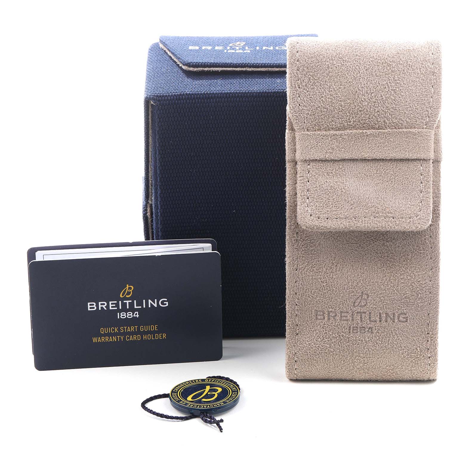 The image shows accessories for the Breitling Avenger A17318 Men's Stainless Steel Black Dial model, including a box, card holder, soft pouch, and tag.