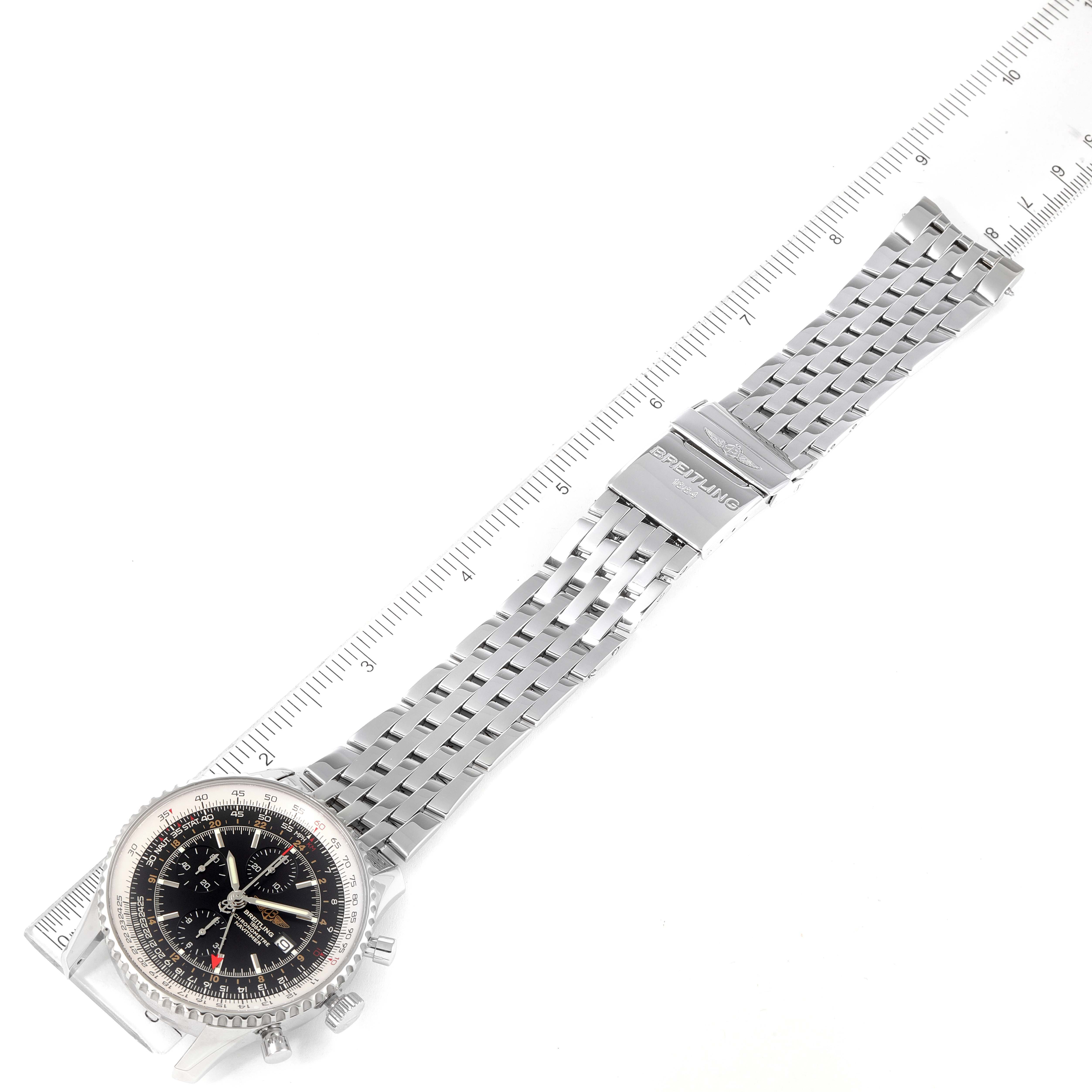 The image shows a Breitling Navitimer A24322 Men
s Stainless Steel Black Dial A24322 Men
s Stainless Steel Black Dial watch laid flat with its face up and bracelet extended, alongside a ruler for scale.