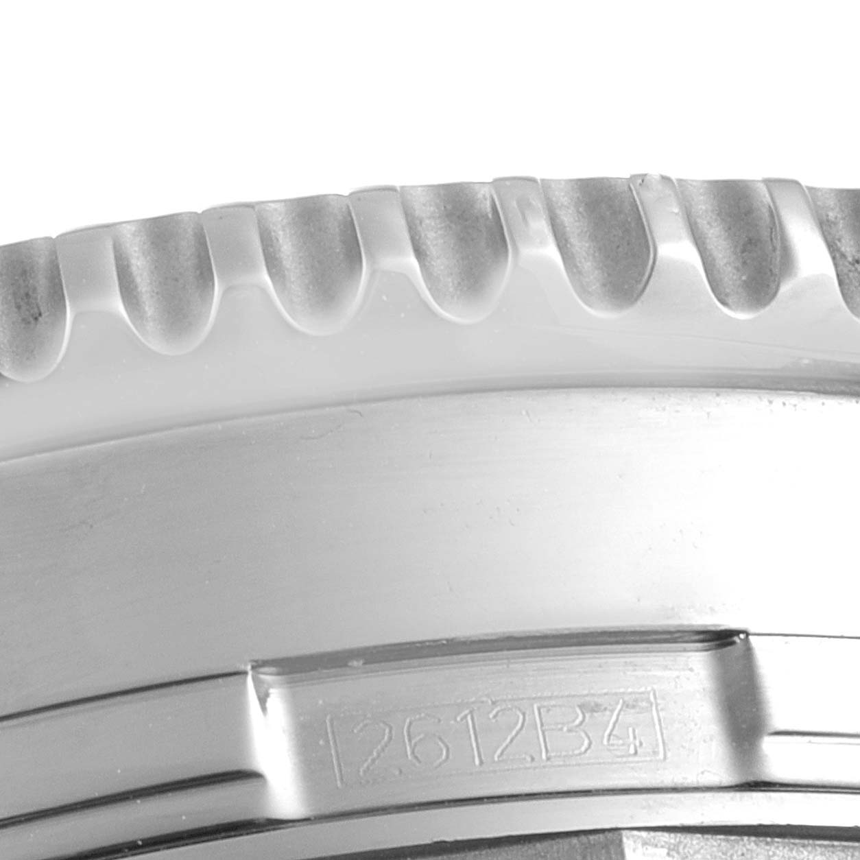 The image shows a close-up of the bezel of a Breitling Navitimer A24322 Men
s Stainless Steel Black Dial A24322 Men
s Stainless Steel Black Dial watch.