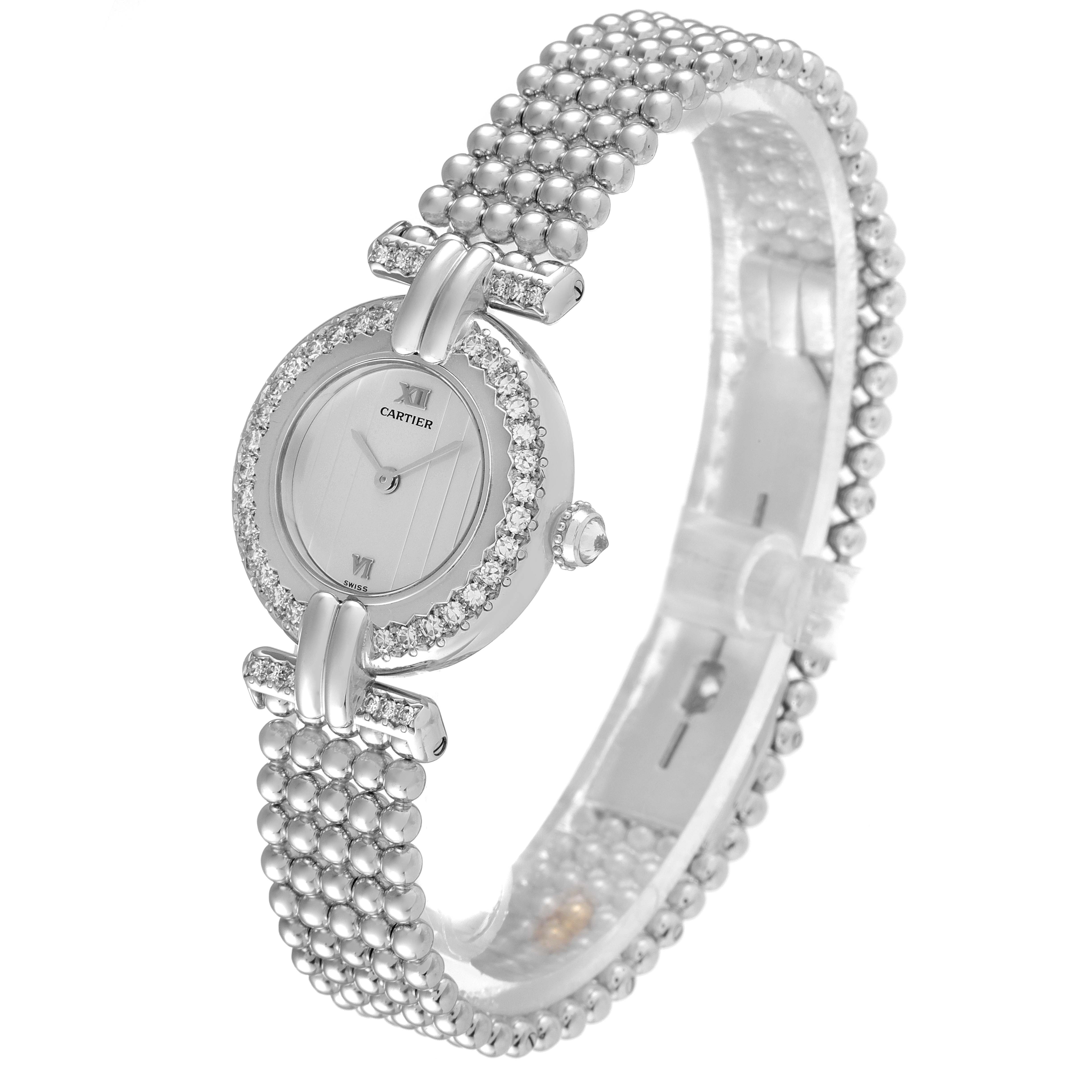The Cartier Colisee 1981 Women's White Gold Silver Dial 1981 Women's White Gold Silver Dial watch is shown at a slight angle, highlighting its round face, diamond bezel, and beaded bracelet.