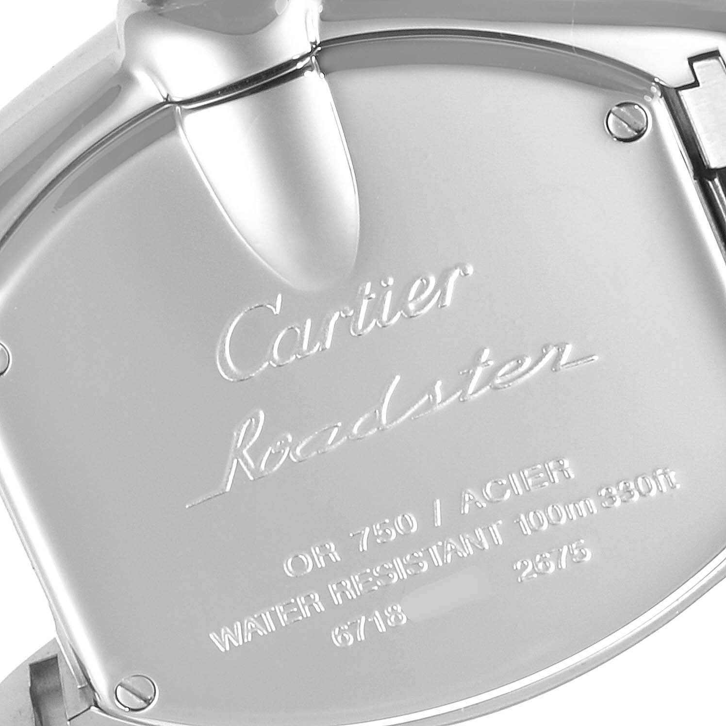 This is a close-up of the back case of a Cartier Roadster W62026Y4 Women's Steel and Gold (two tone) Silver Dial W62026Y4 Women's Steel and Gold (two tone) Silver Dial watch showing engraved details.