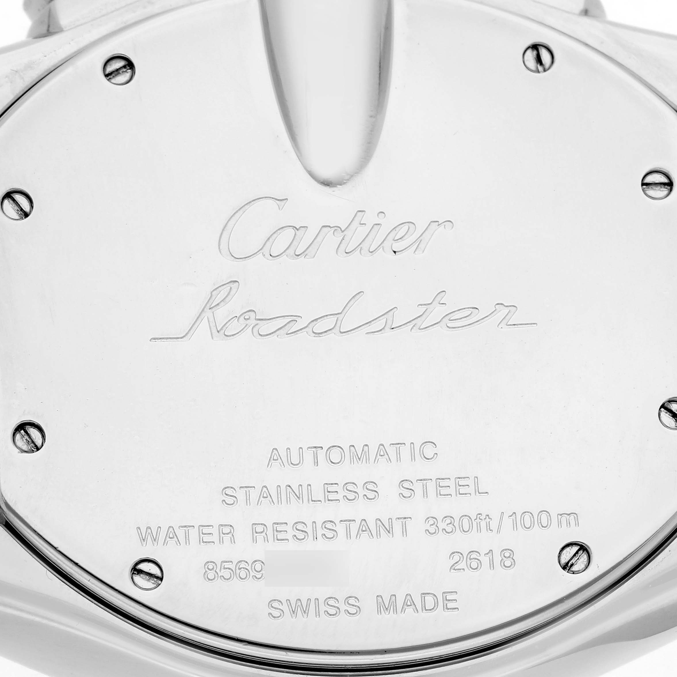 The image shows the back case of a Cartier Roadster W62020X6 Men's Stainless Steel Black Dial W62020X6 Men's Stainless Steel Black Dial watch, displaying engravings and screw details.