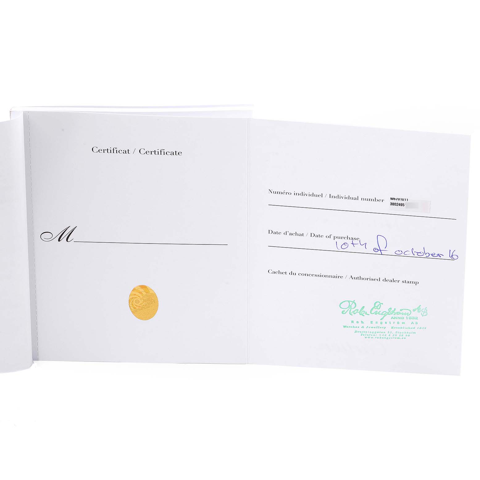 This image shows the certificate and warranty papers for a Cartier Ronde W6701011 Men
s Stainless Steel Silver Dial W6701011 Men
s Stainless Steel Silver Dial watch.