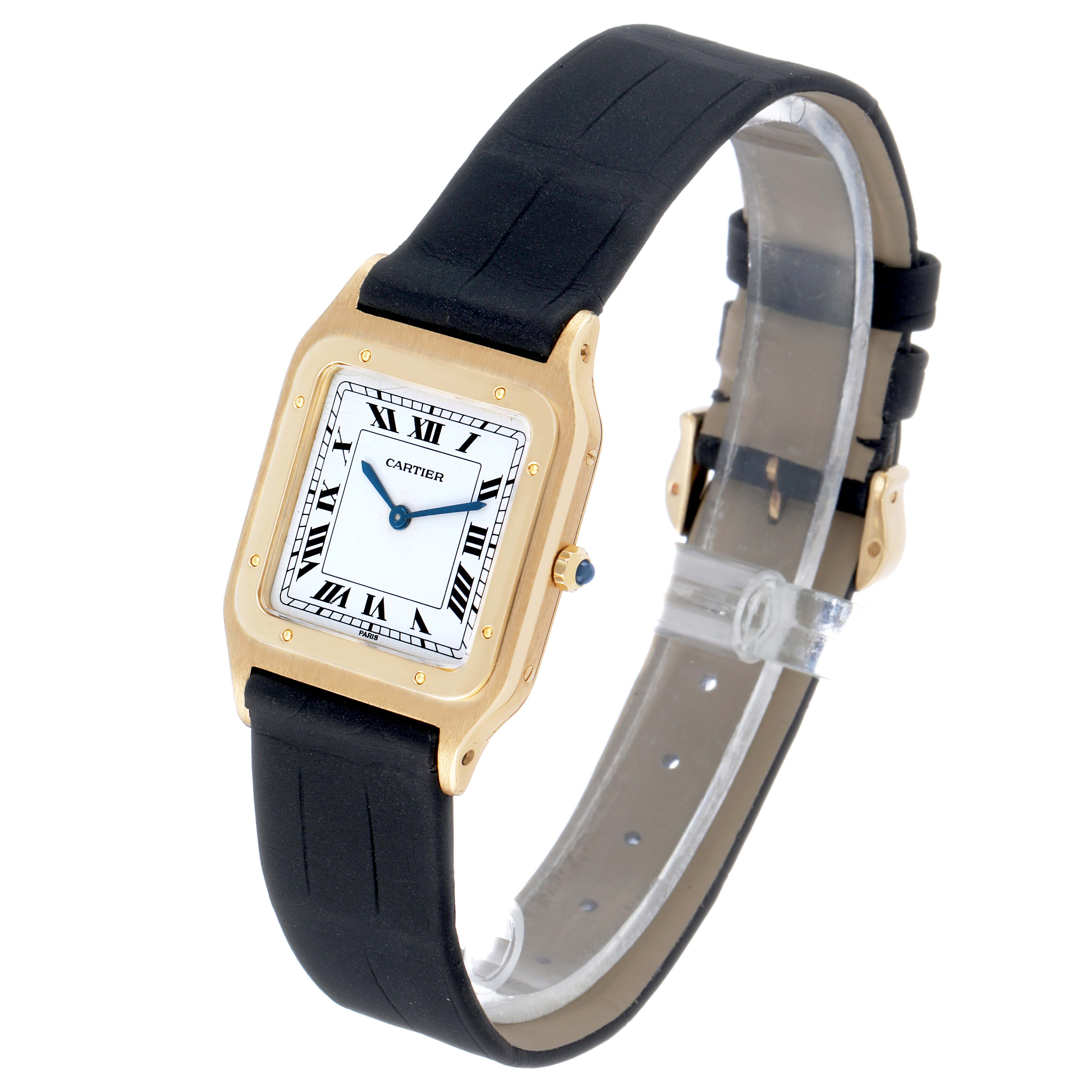 The image shows a Cartier Santos Dumont W1505453 Men's Yellow Gold White Dial watch at a three-quarter angle, highlighting the square face, Roman numerals, and black strap.
