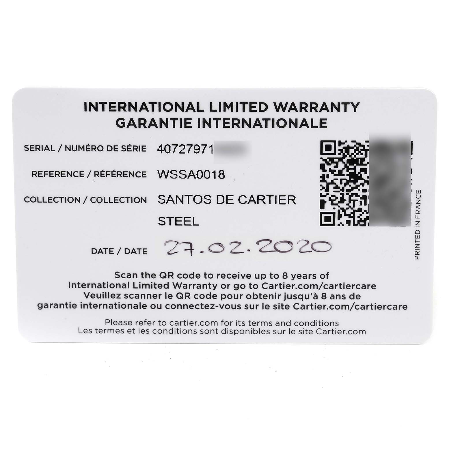 The image shows the front side of the International Limited Warranty card for the Santos de Cartier model in steel.
