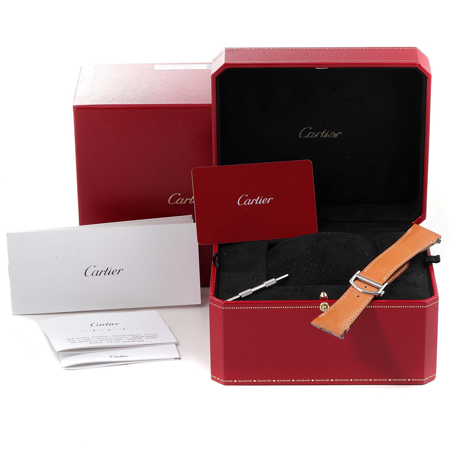 This image shows a Cartier Santos WSSA0018 Men's Stainless Steel Silver Dial WSSA0018 Men's Stainless Steel Silver Dial watch box, extra leather strap, manuals, and a tool.