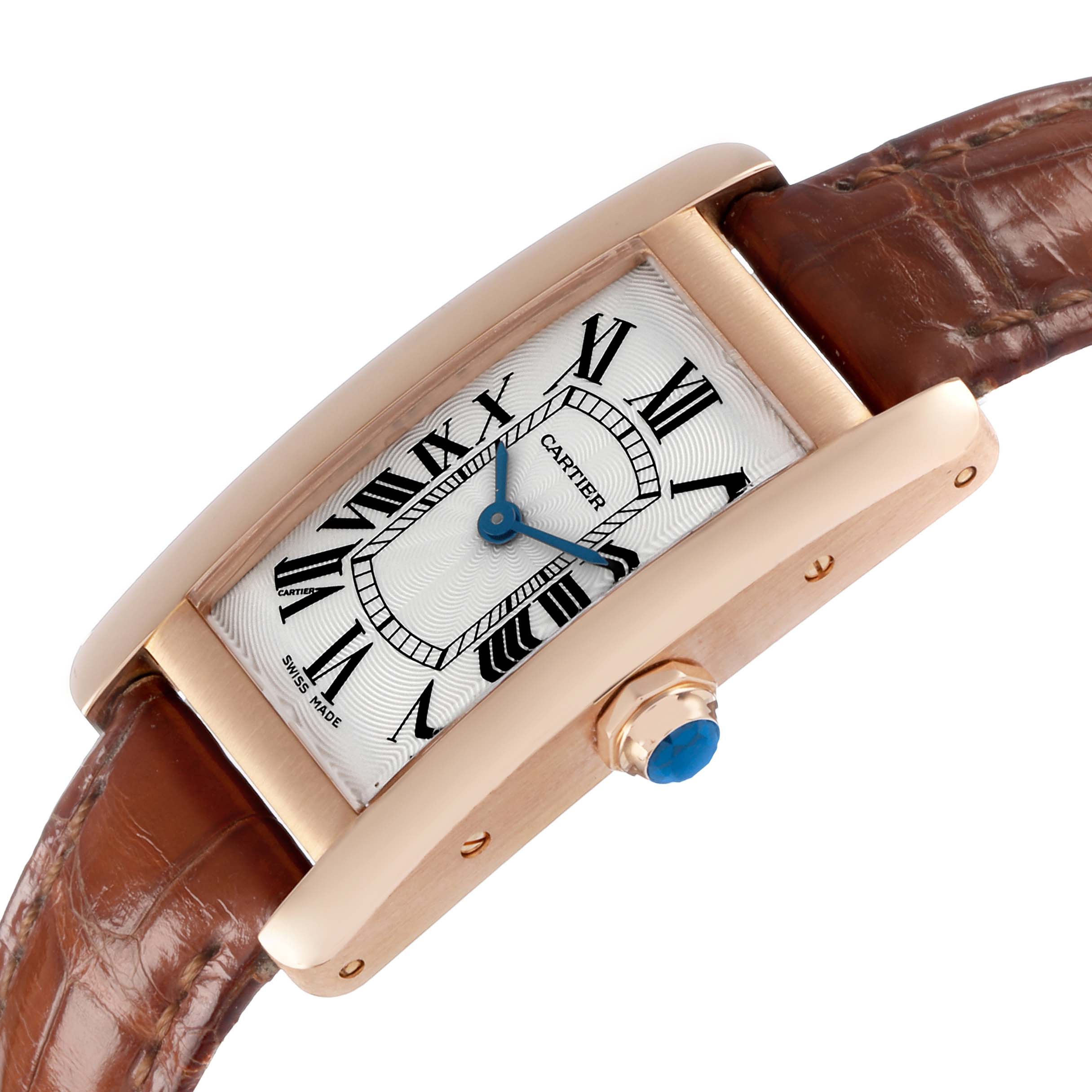 The Cartier Tank Americaine W2607456 Men's Rose Gold Silver Dial watch is shown at an angle highlighting the rectangular face, roman numerals, blue hands, and brown leather strap.