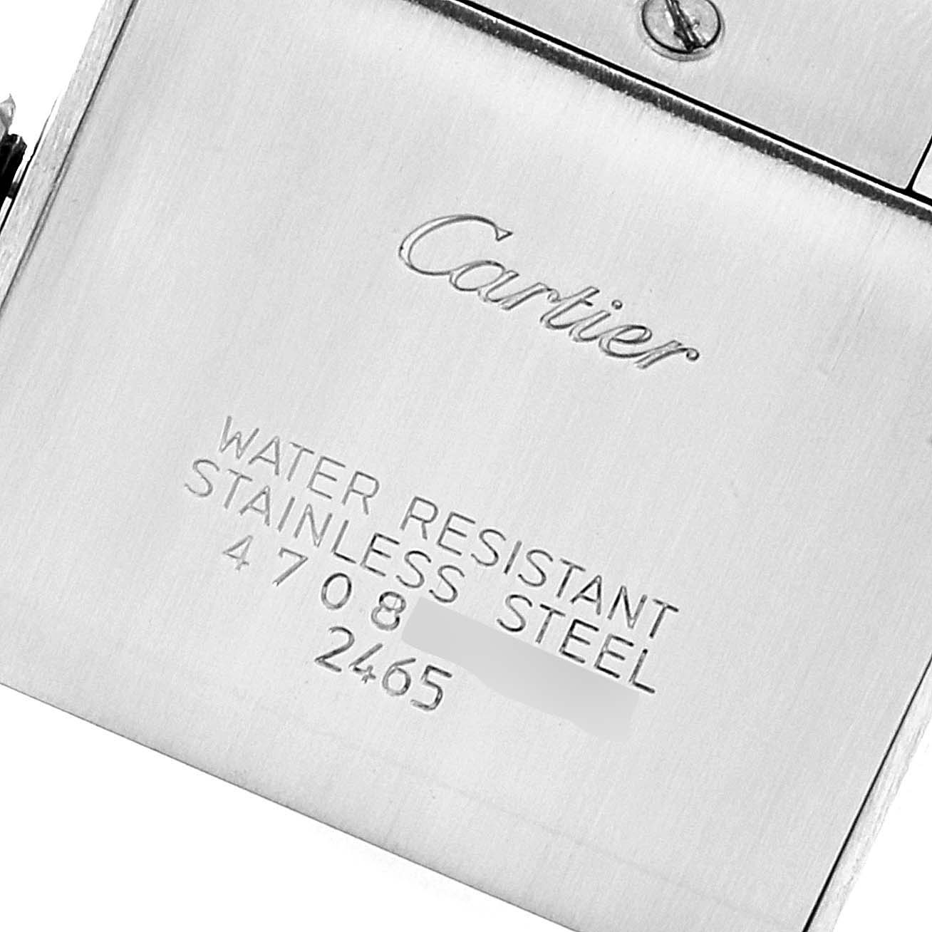 This image shows the back casing of a Cartier Tank Francaise W51011Q3 Women's Stainless Steel Silver Dial W51011Q3 Women's Stainless Steel Silver Dial watch, displaying the brand name, water resistance, and stainless steel indication.