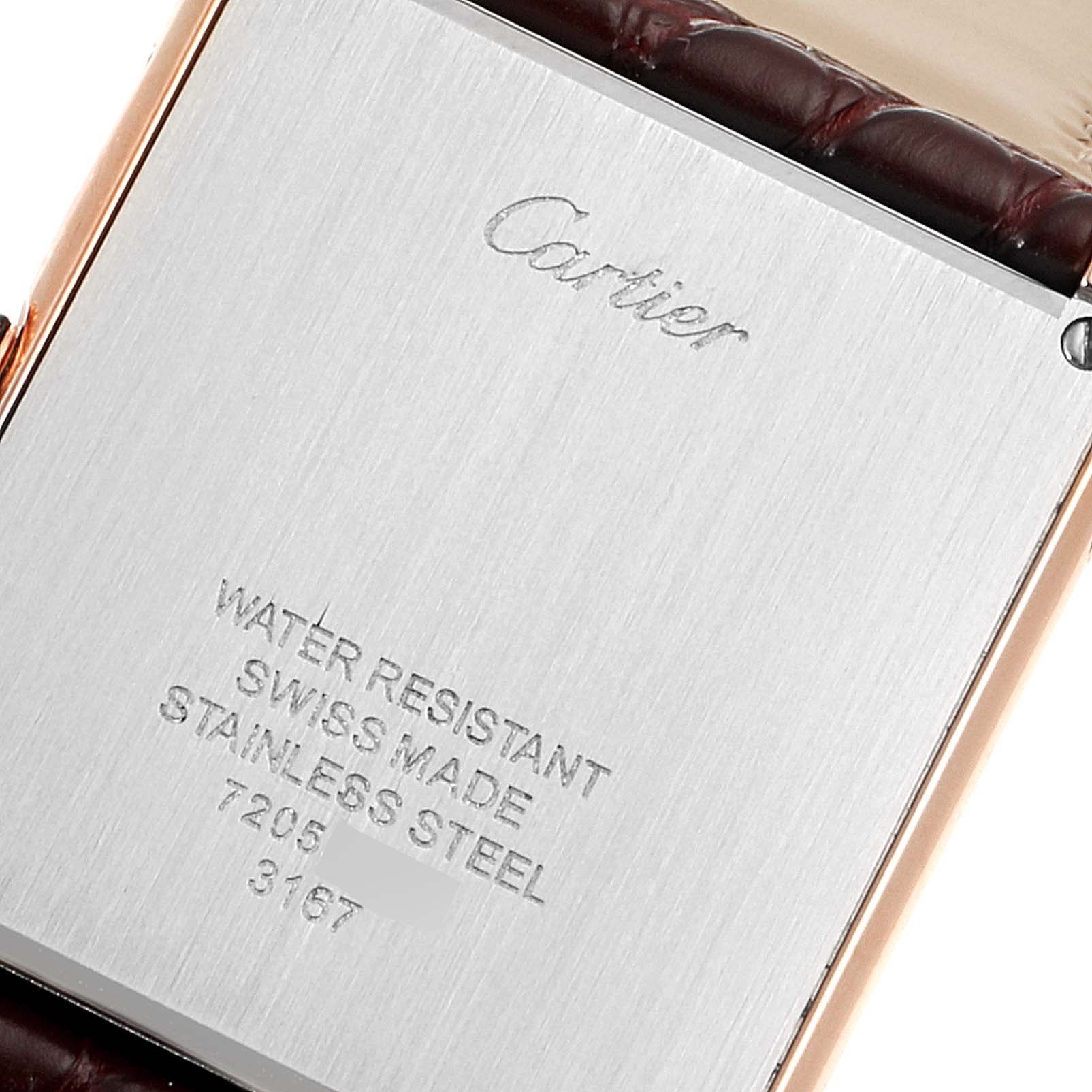 This is the back of a Cartier Tank Solo W5200025 Men's Rose Gold Silver Dial W5200025 Men's Rose Gold Silver Dial watch, showing the engraved details and part of the leather strap.