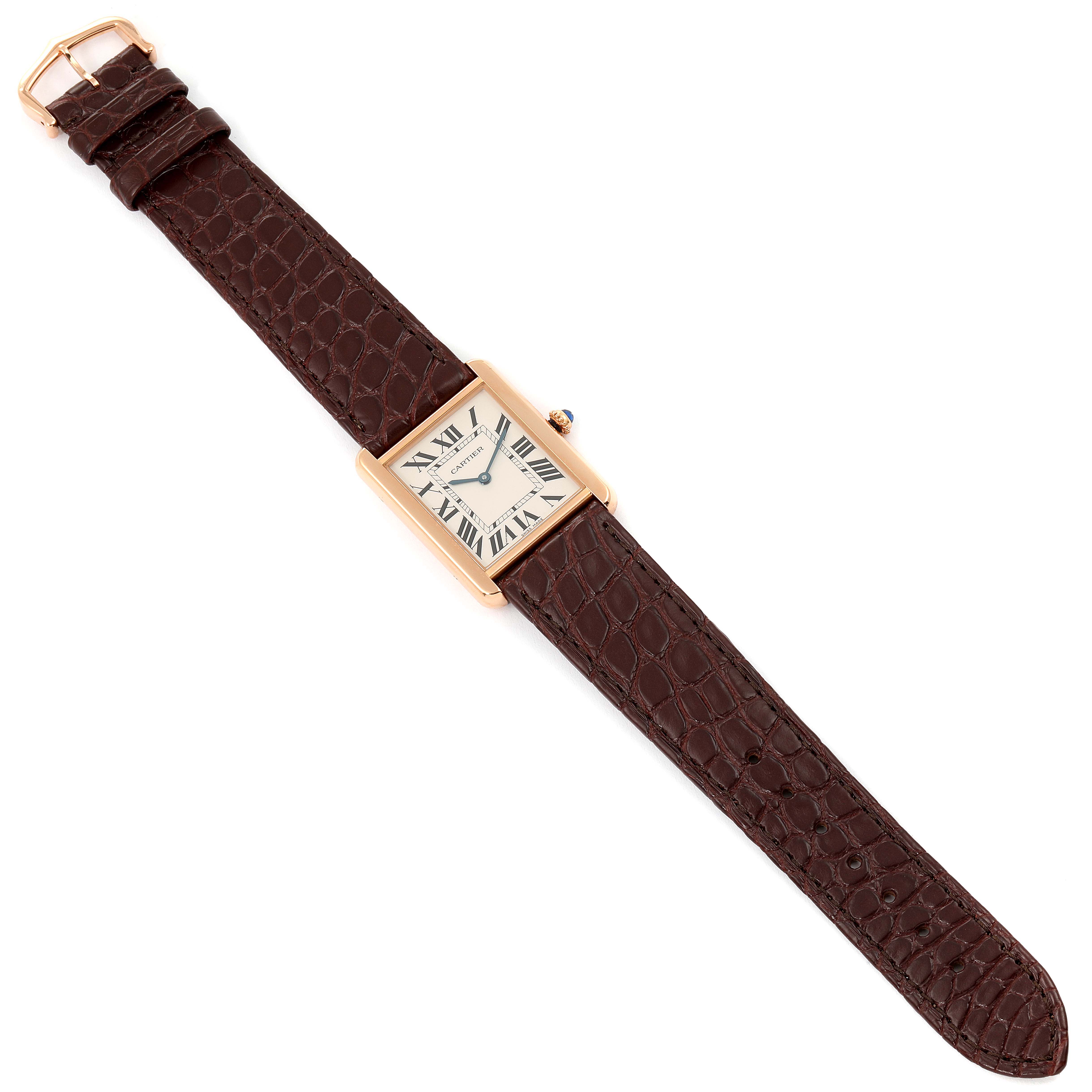 The Cartier Tank Solo W5200025 Men's Rose Gold Silver Dial W5200025 Men's Rose Gold Silver Dial watch is shown from a top-down angle, displaying its rectangular face and brown leather strap.