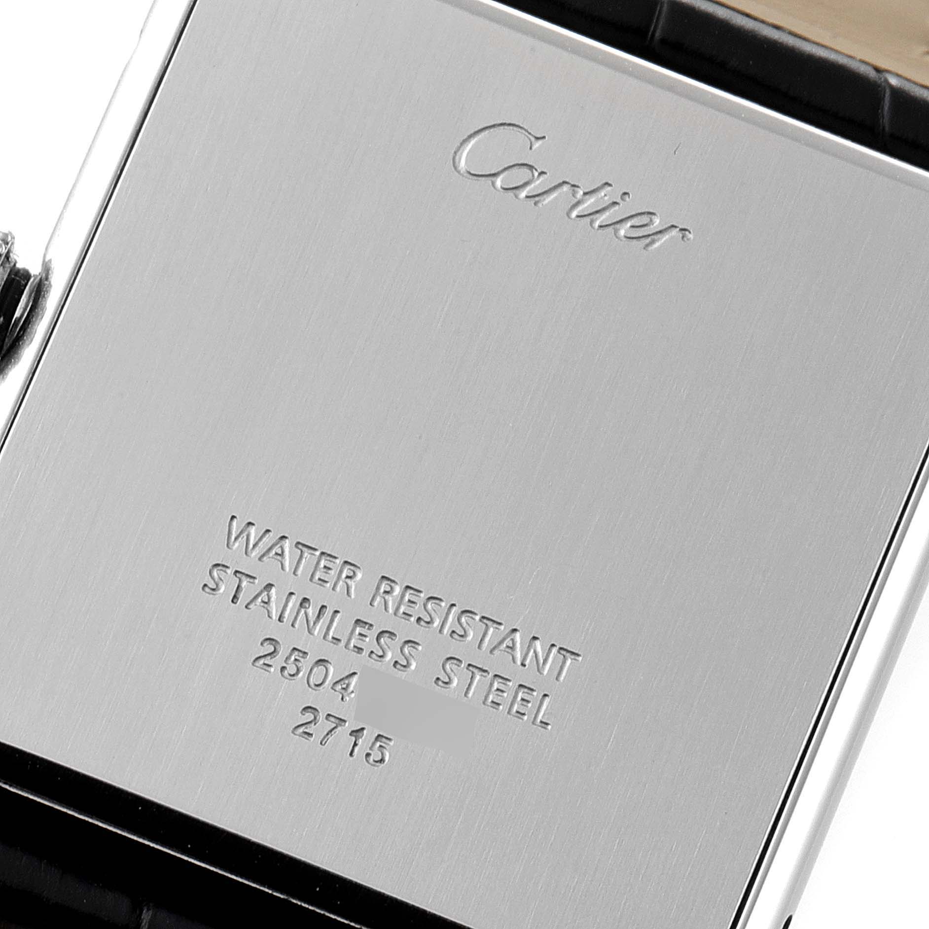 The image shows the back case of a Cartier Tank Solo W1018355 Men
s Stainless Steel Silver Dial W1018355 Men
s Stainless Steel Silver Dial watch, highlighting the brand engraving and specifications.