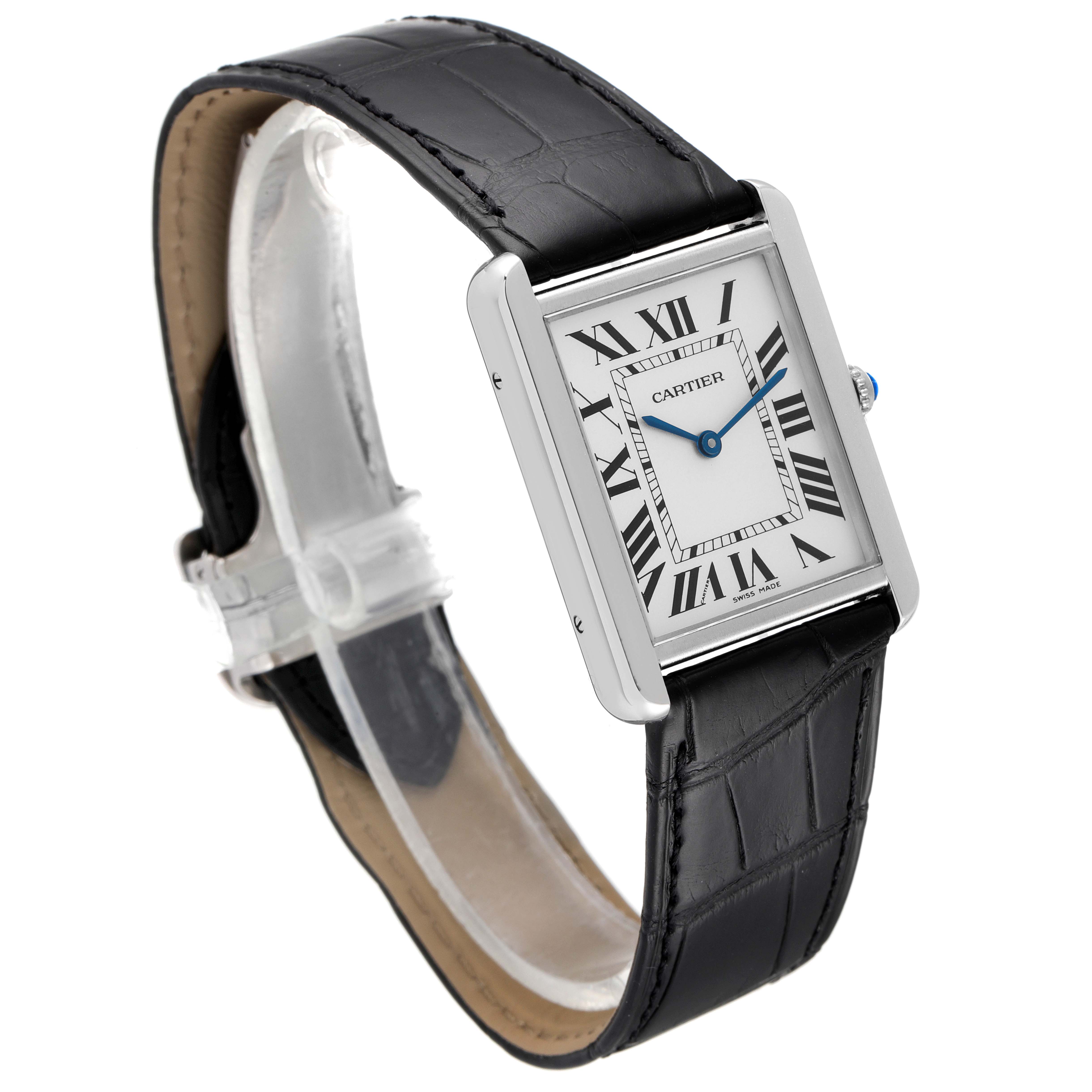 The image shows a Cartier Tank Solo W1018355 Men
s Stainless Steel Silver Dial W1018355 Men
s Stainless Steel Silver Dial watch at an angle highlighting its face, Roman numerals, black leather strap, and rectangular case.
