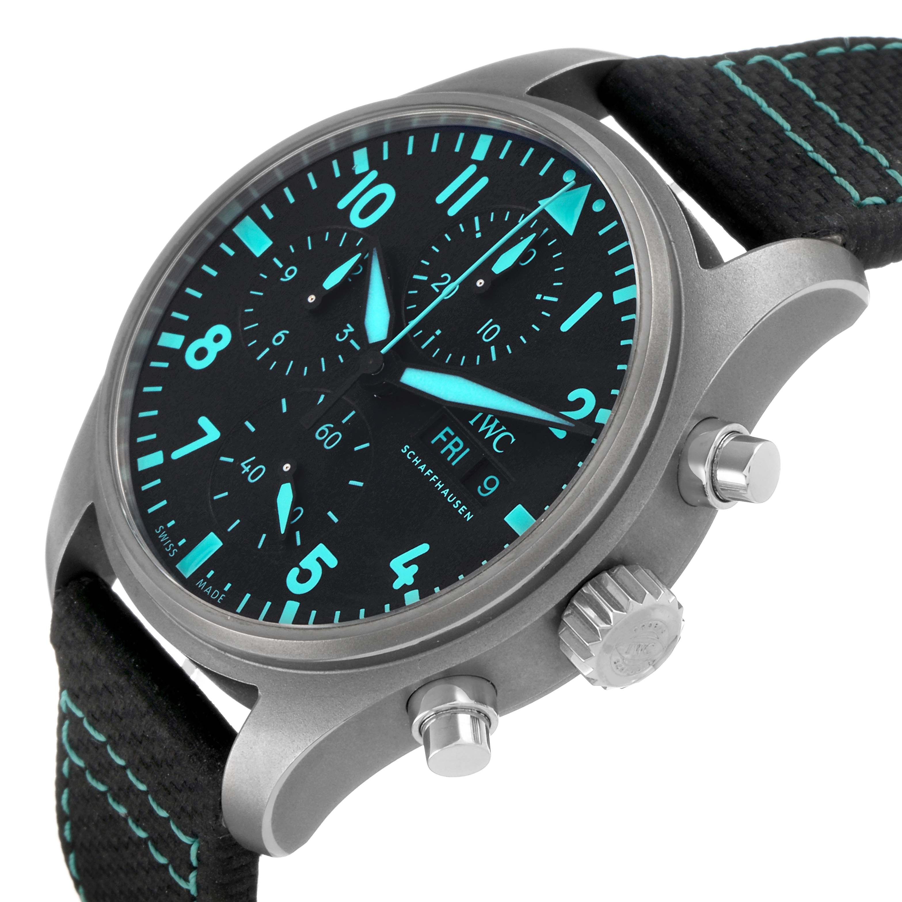 The IWC Pilot IW388114 Men's Titanium Black Dial model watch is shown from a front-side angle, highlighting its face, case, crown, and strap.