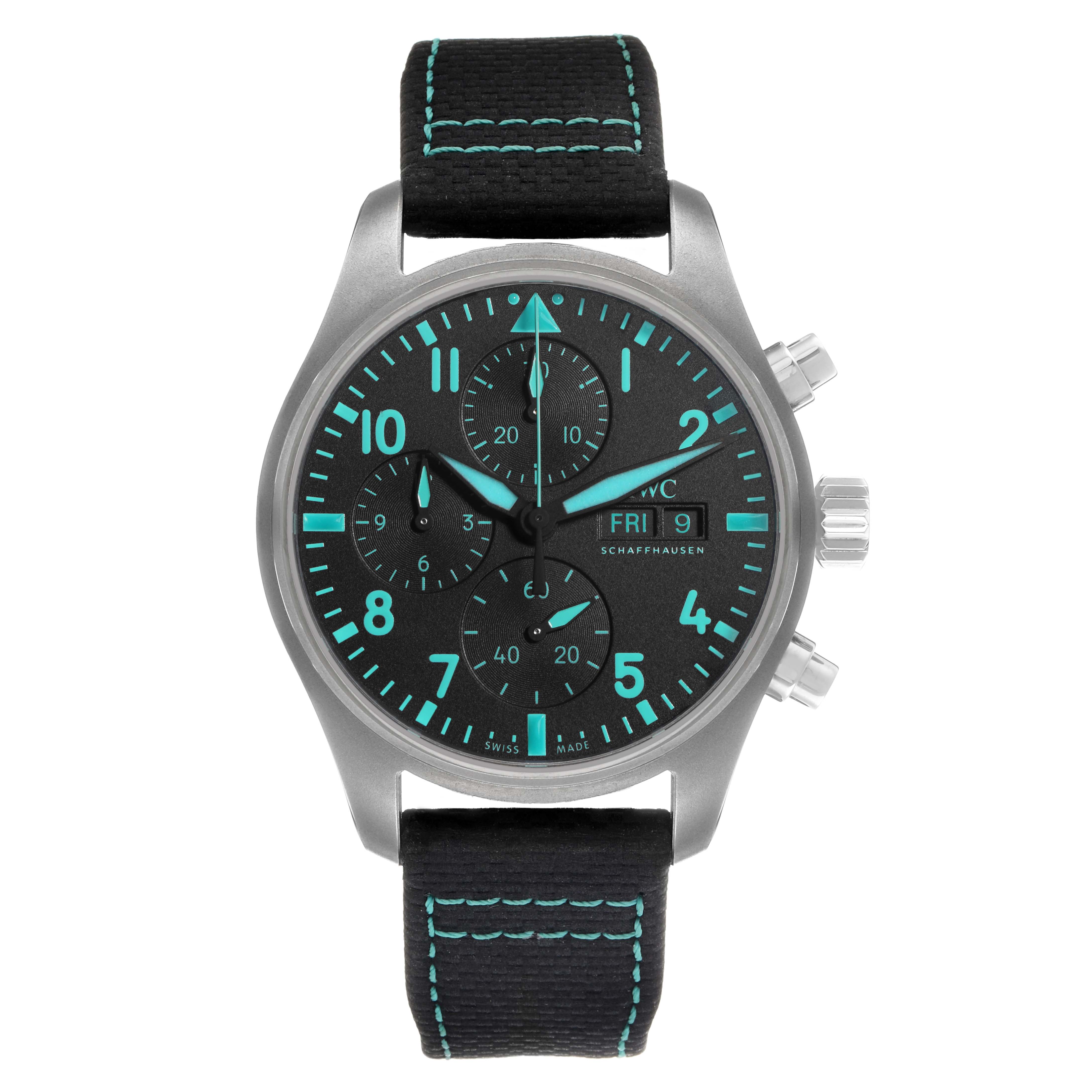 This IWC Pilot IW388114 Men's Titanium Black Dial model watch is shown from the front, highlighting its dial, luminescent markers, crown, pushers, and strap.