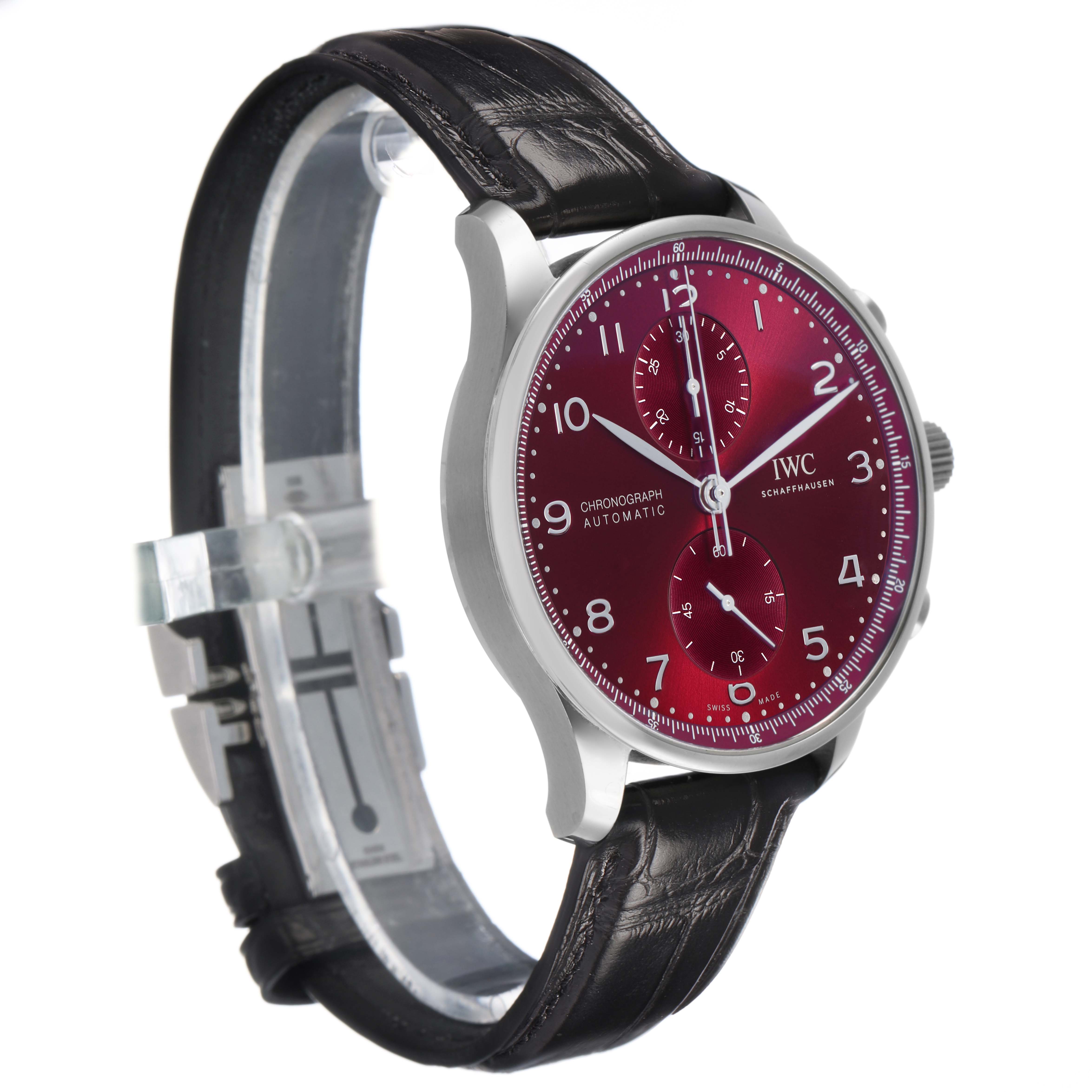 The IWC Portuguese IW371616 Men's Stainless Steel Red Dial model is shown at a three-quarter angle, displaying the dial, case, lugs, crown, and strap.