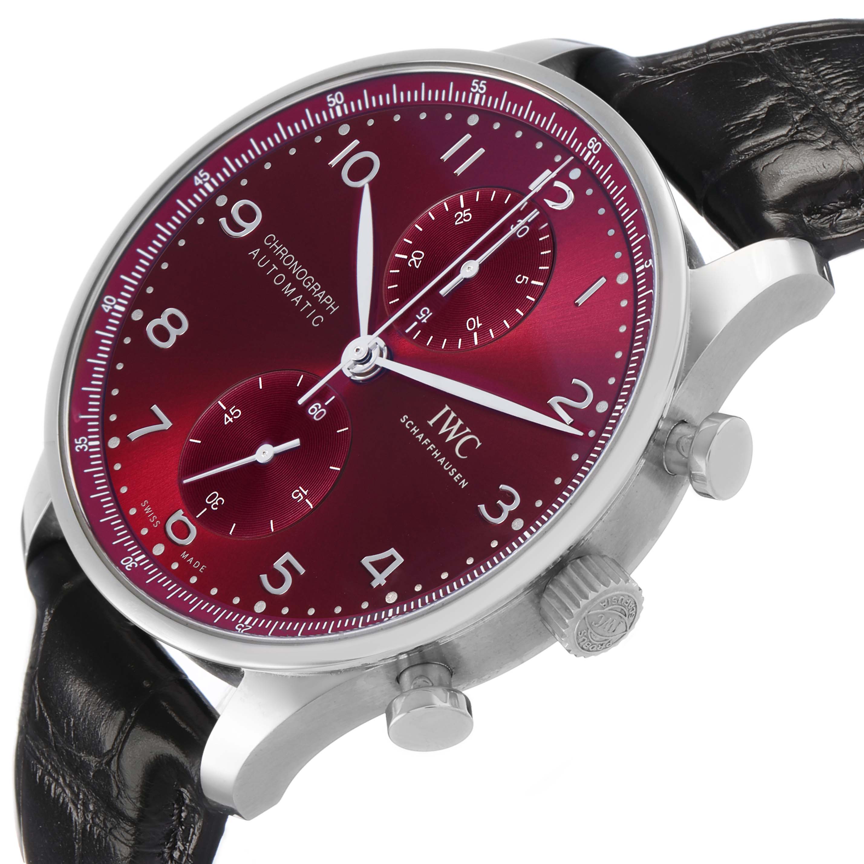 The IWC Portuguese IW371616 Men's Stainless Steel Red Dial watch is shown from a frontal angle, highlighting the dial, crown, pushers, and black leather strap.
