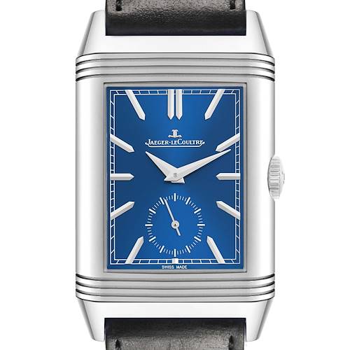 The Jaeger-LeCoultre Reverso watch is shown from the front, highlighting its rectangular case, blue dial, and leather strap.