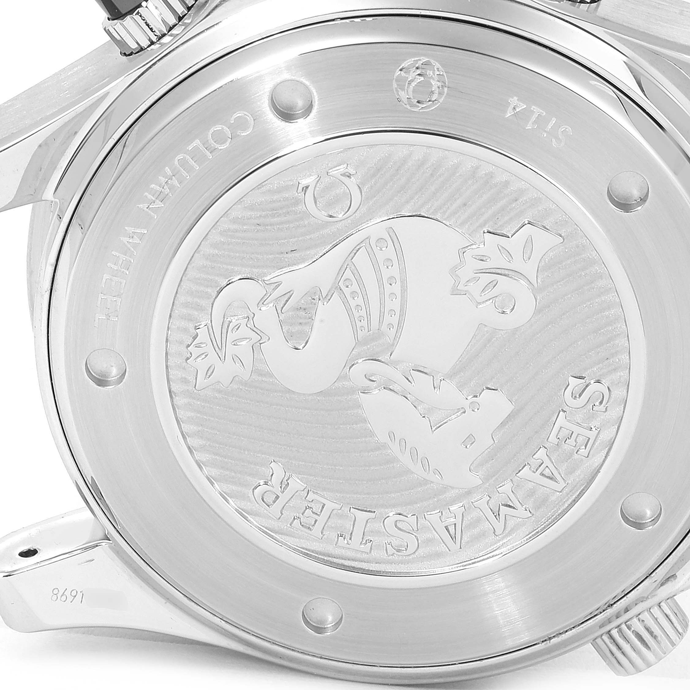 The image shows the case back of an Omega Seamaster 212.30.44.50.03.001 Men's Stainless Steel Blue Dial 212.30.44.50.03.001 Men's Stainless Steel Blue Dial watch at an angled close-up view, highlighting the engravings and logo.