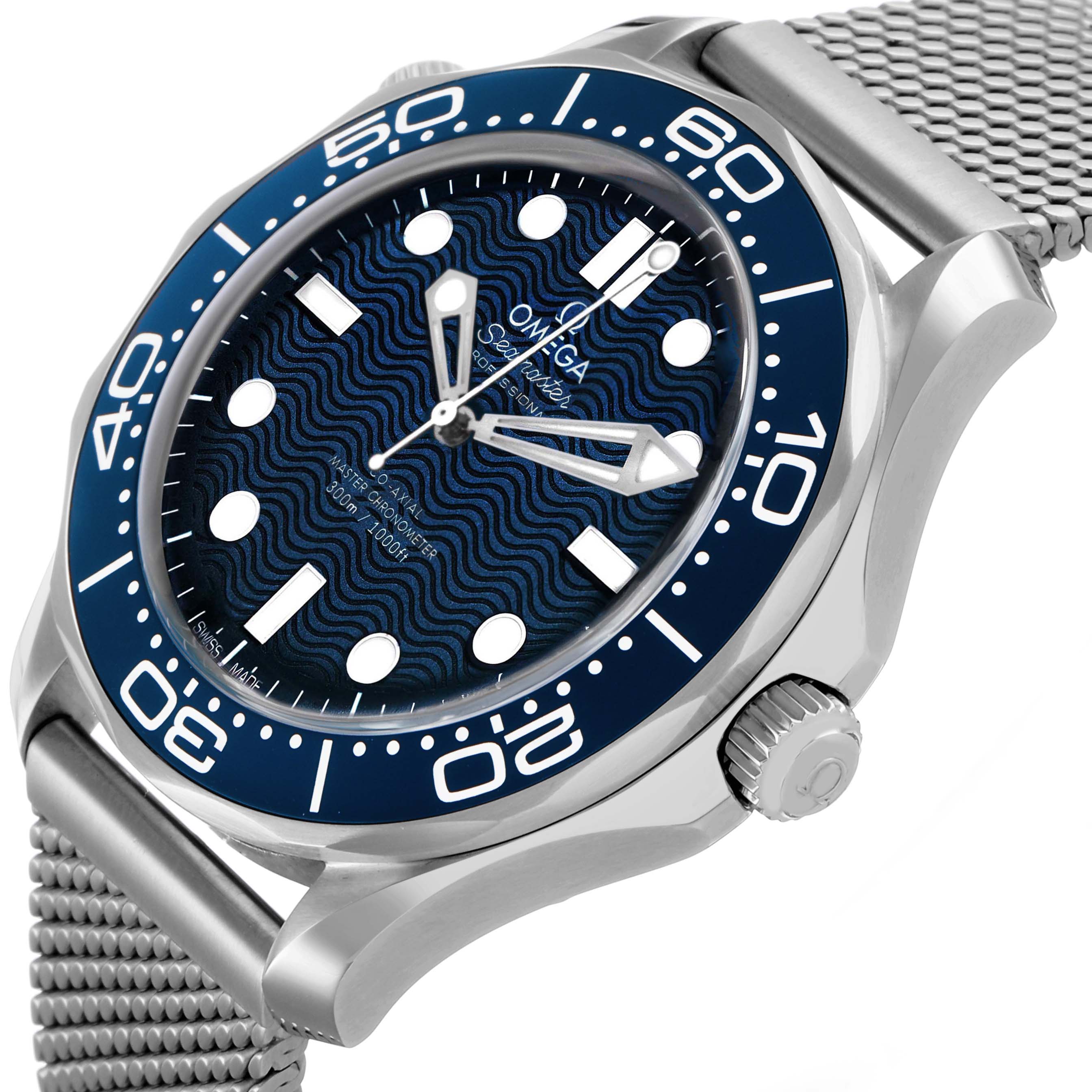 The Omega Seamaster 210.30.42.20.03.002 Men's Stainless Steel Blue Dial watch is shown at an angled side view, highlighting the bezel, dial, crown, and metal bracelet.