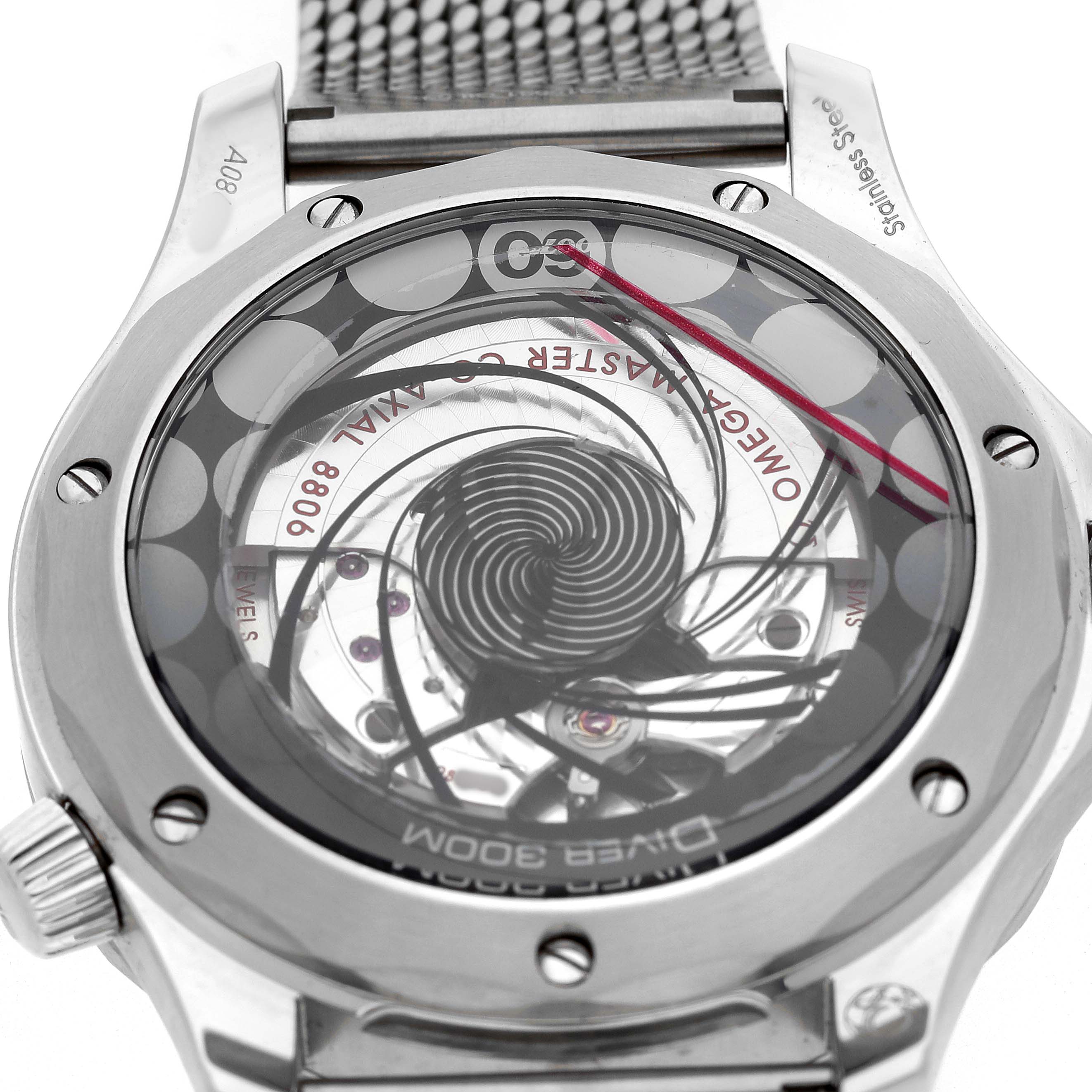 The image shows the back of the Omega Seamaster 210.30.42.20.03.002 Men's Stainless Steel Blue Dial watch, highlighting its exposed movement and metal bracelet.