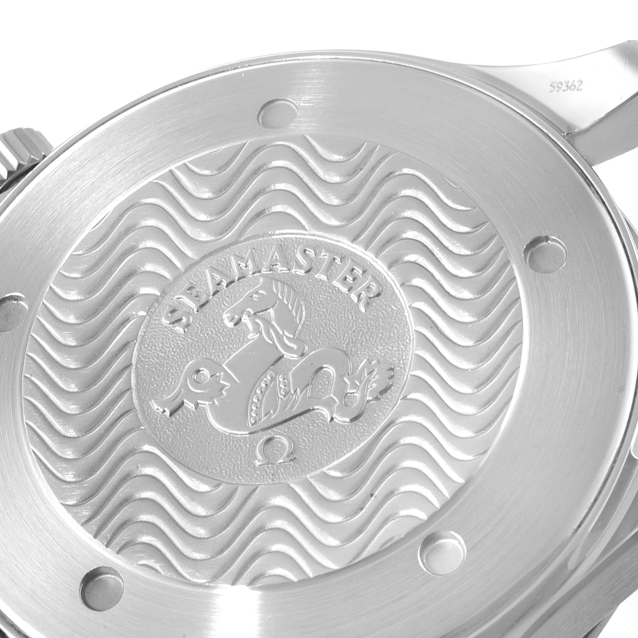 The image shows a close-up of the back cover of an Omega Seamaster 2265.80.00 Men's Stainless Steel Blue Dial 2265.80.00 Men's Stainless Steel Blue Dial watch, highlighting its engraved design and texture.