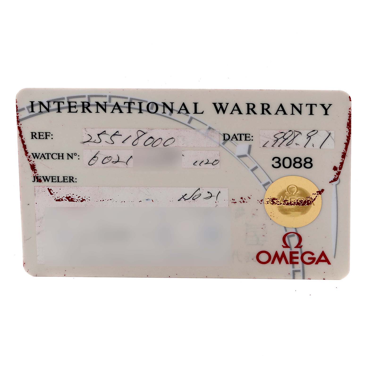 The image shows an Omega Seamaster 2551.80.00 Men
s Stainless Steel Blue Dial 2551.80.00 Men
s Stainless Steel Blue Dial International Warranty card from a top view.