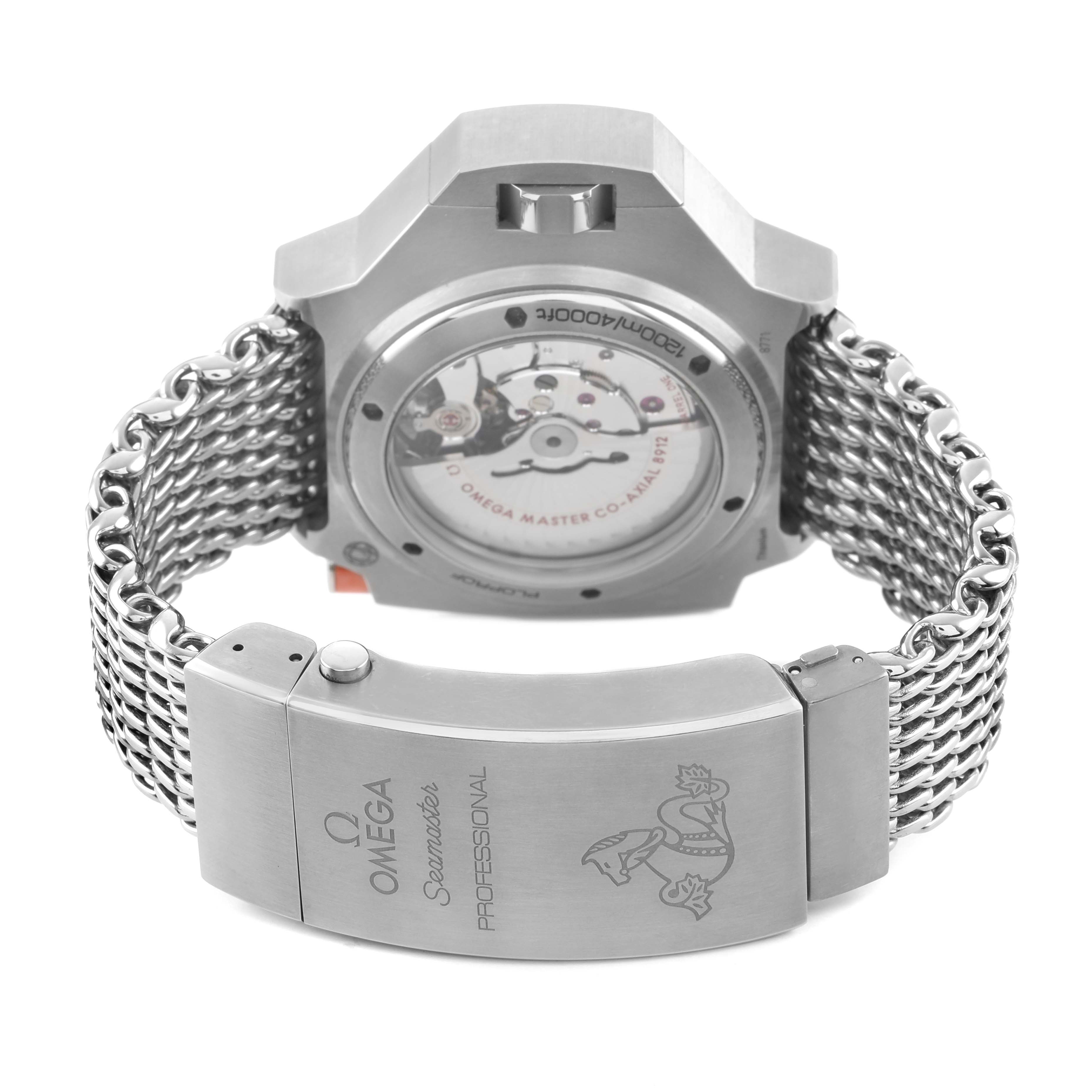 The image shows the back of an Omega Ploprof 227.90.55.21.99.002 Men's Titanium Grey Dial watch, highlighting its movement and metal bracelet clasp.
