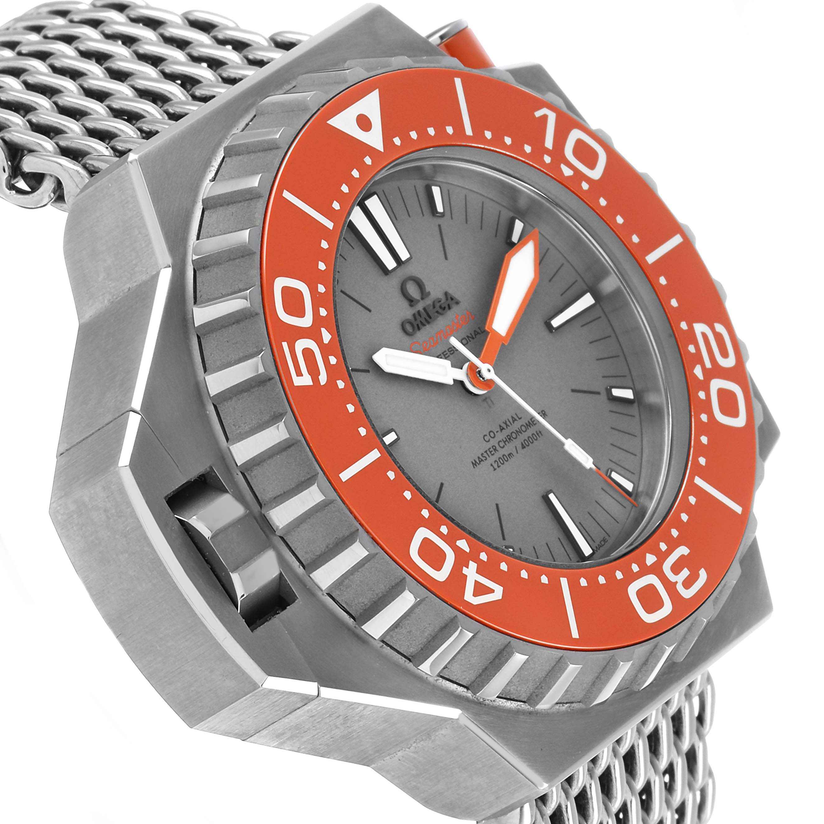 The Omega Ploprof 227.90.55.21.99.002 Men's Titanium Grey Dial watch is shown at an angle highlighting the face, orange bezel, and stainless steel mesh bracelet.