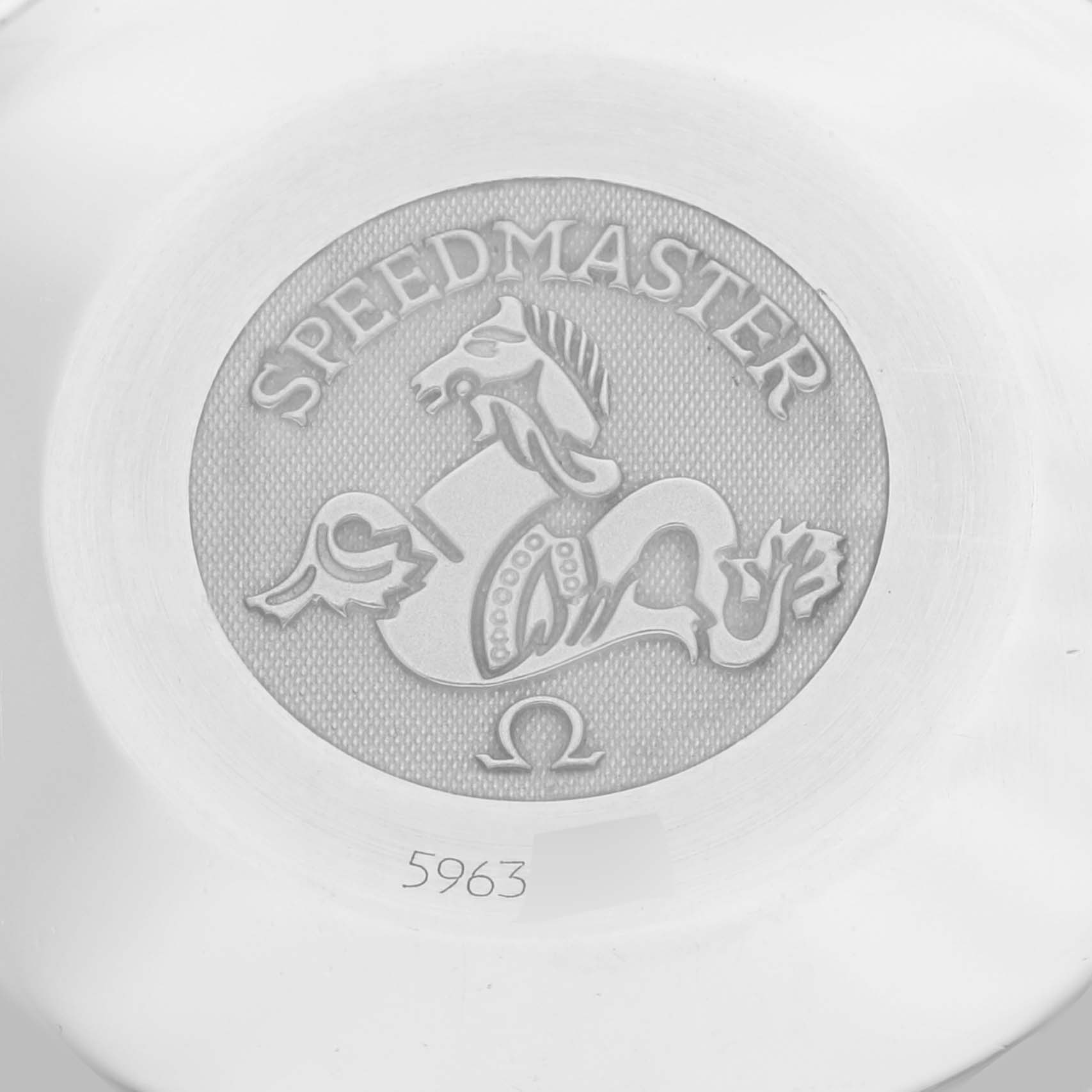 The image shows the case back of an Omega Speedmaster 3513.50.00 Men
s Stainless Steel Black Dial 3513.50.00 Men
s Stainless Steel Black Dial watch, featuring engraved branding and a decorative emblem.