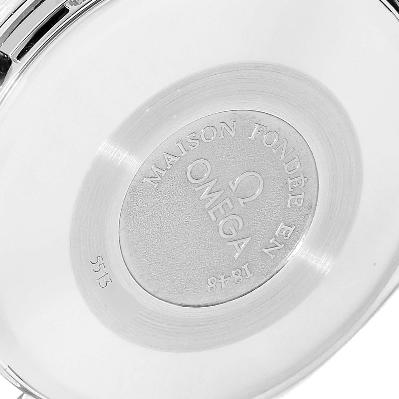 The image shows the case back of an Omega Speedmaster 3521.80.00 Men
s Stainless Steel Blue Dial 3521.80.00 Men
s Stainless Steel Blue Dial watch, displaying the brand
s engraving and emblem.