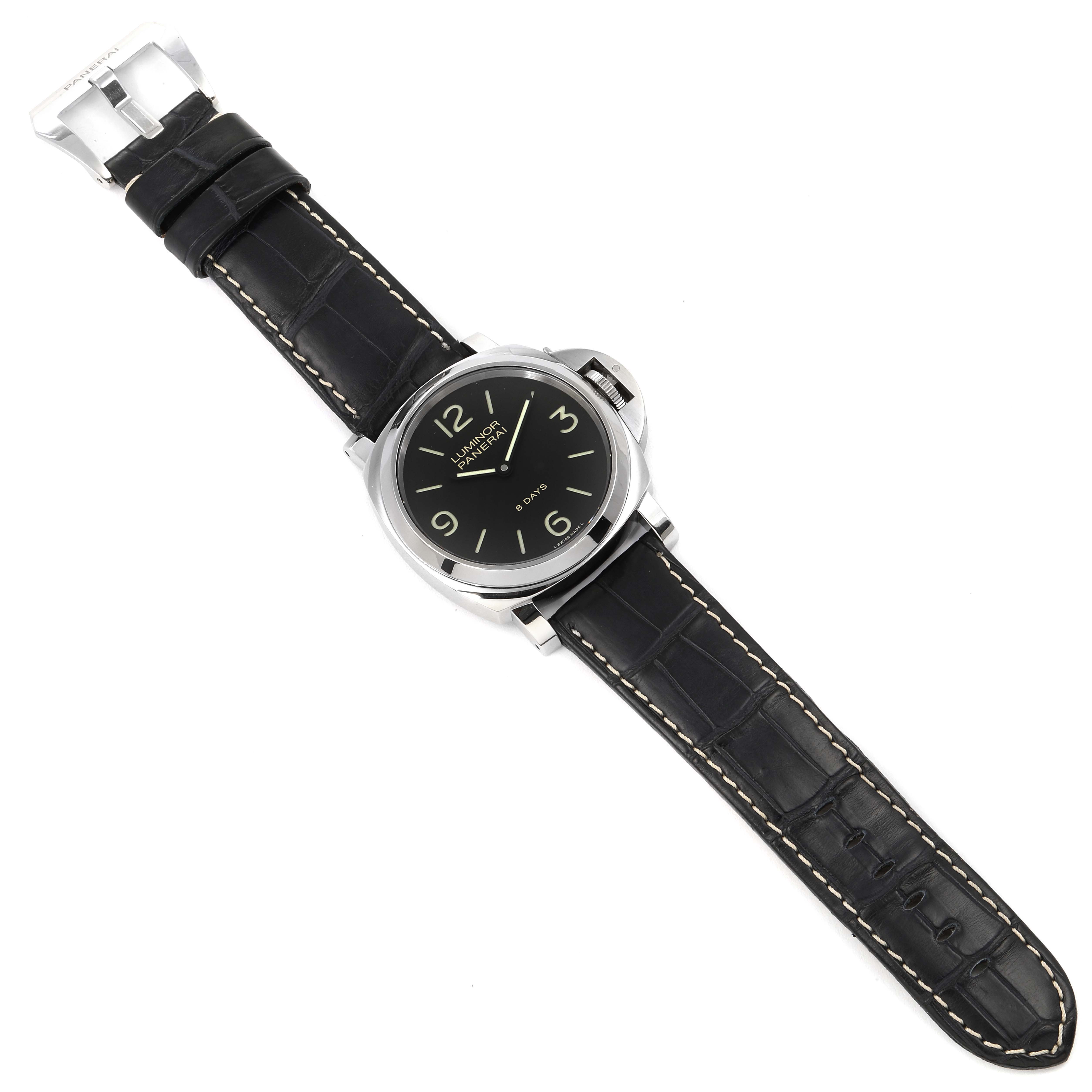 The image shows a top-down view of a Panerai Luminor PAM00560 Men
s Stainless Steel Black Dial PAM00560 Men
s Stainless Steel Black Dial watch with a black leather strap.