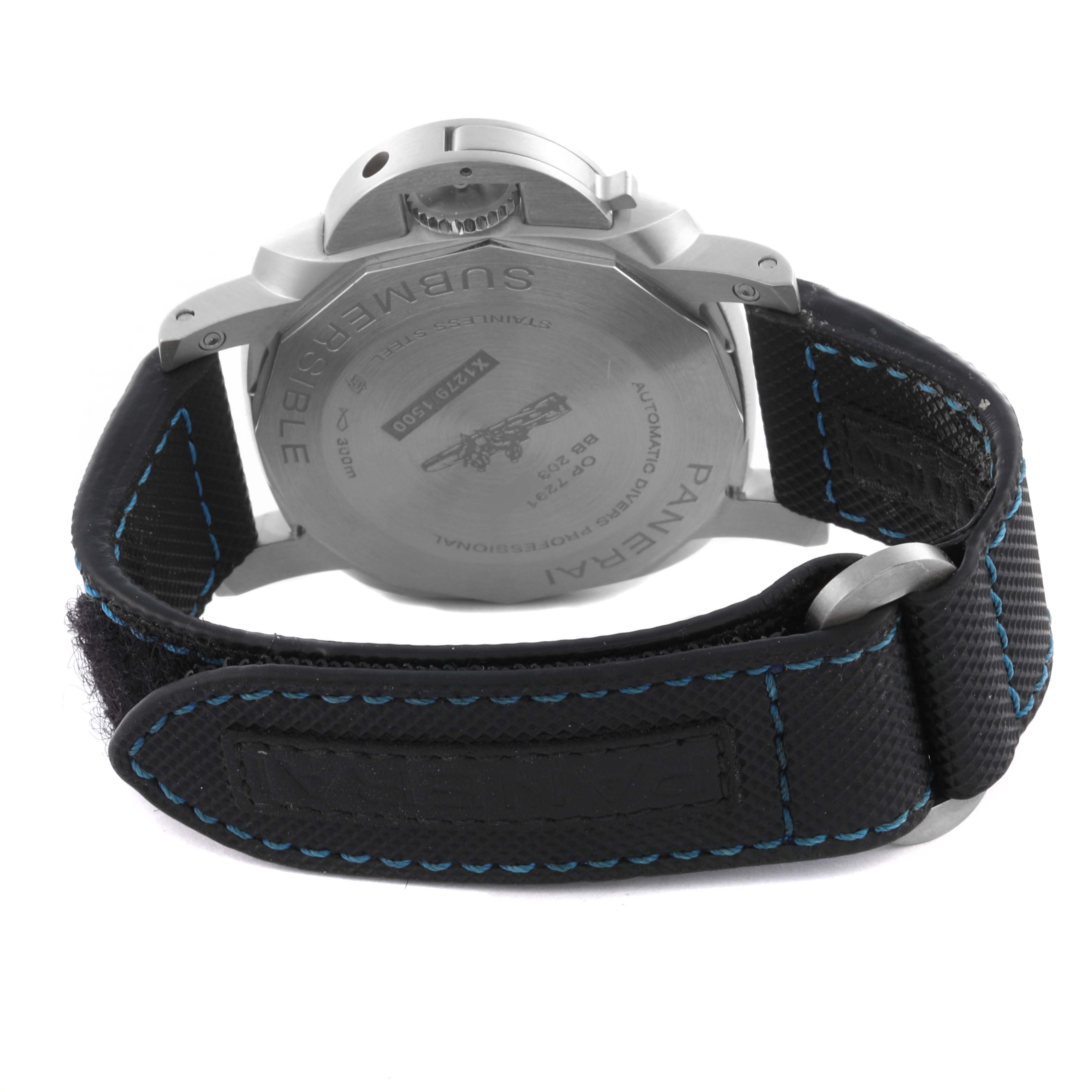The image shows the back view of a Panerai Submersible PAM00973 Men's Stainless Steel Black Dial PAM00973 Men's Stainless Steel Black Dial model, highlighting the case back and strap with blue stitching.
