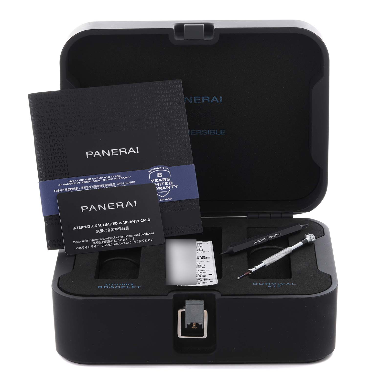 The image shows a top-down view of Panerai Submersible PAM00973 Men's Stainless Steel Black Dial PAM00973 Men's Stainless Steel Black Dial packaging, including manuals, a warranty card, tools, and a storage case.