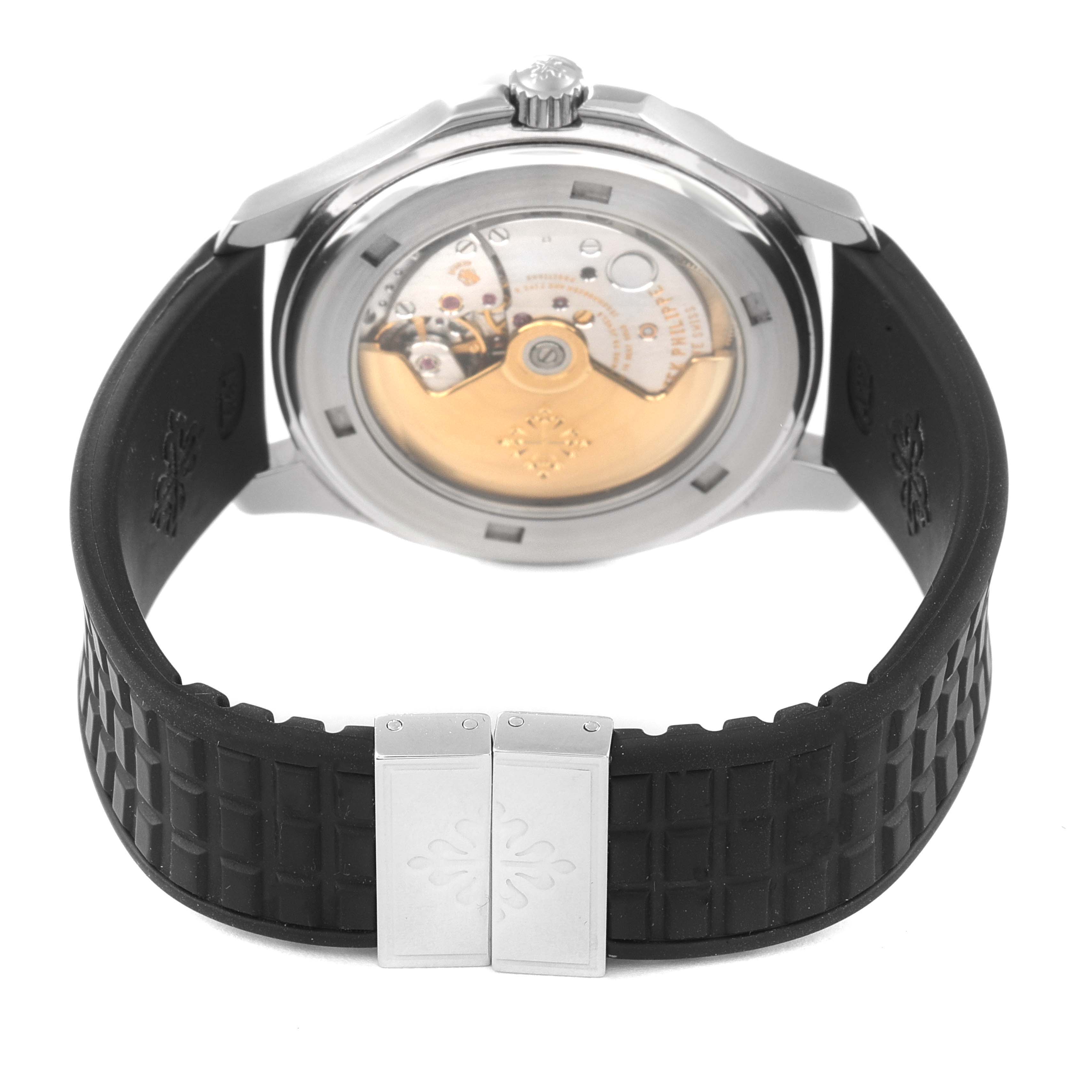 The image shows the back view of a Patek Philippe Aquanaut 5065/1A-010 Men's Stainless Steel Black Dial 5065/1A-010 Men's Stainless Steel Black Dial watch, focusing on its case back and rubber strap.