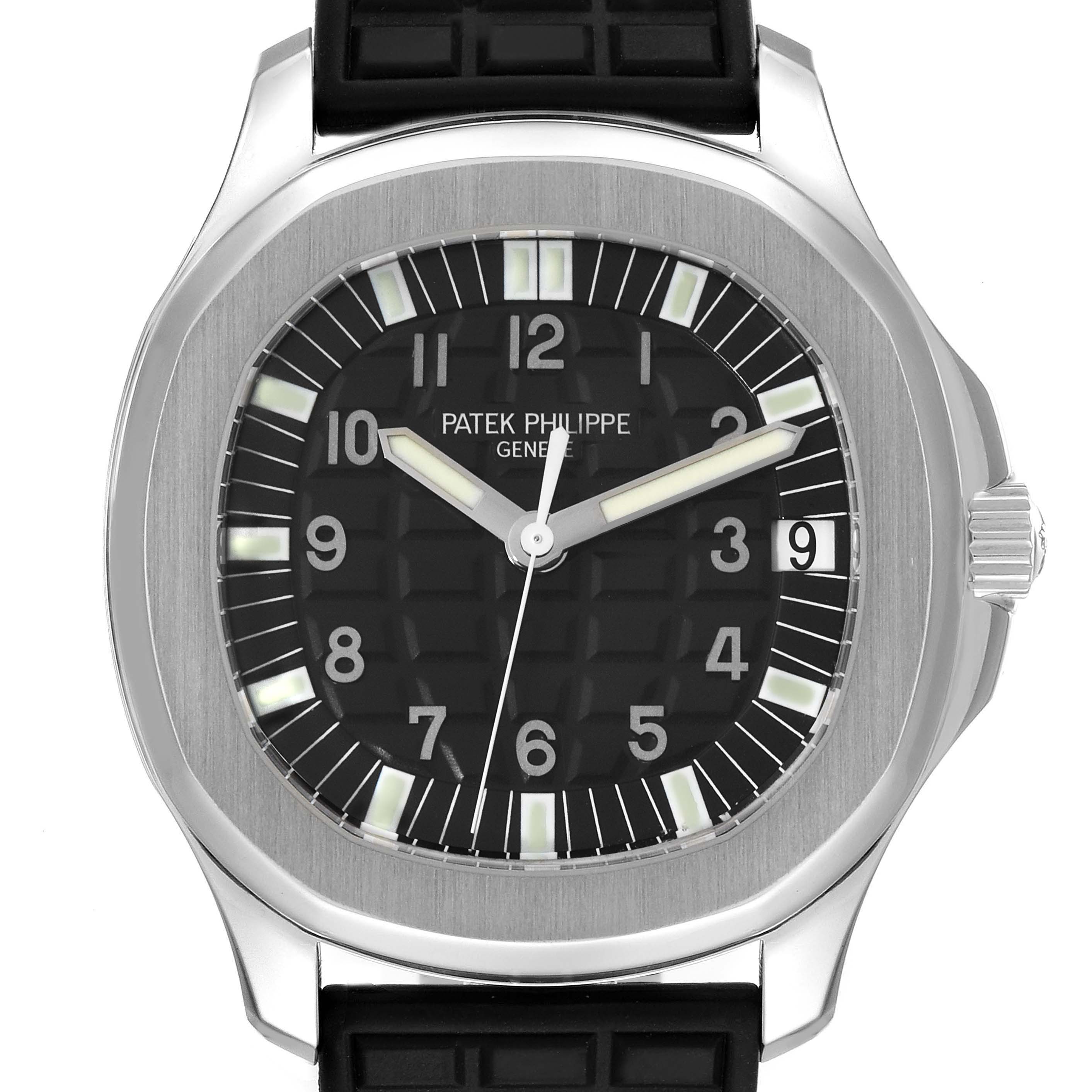 The image shows a front view of the Patek Philippe Aquanaut 5065/1A-010 Men's Stainless Steel Black Dial 5065/1A-010 Men's Stainless Steel Black Dial watch, highlighting the dial, bezel, and part of the strap.