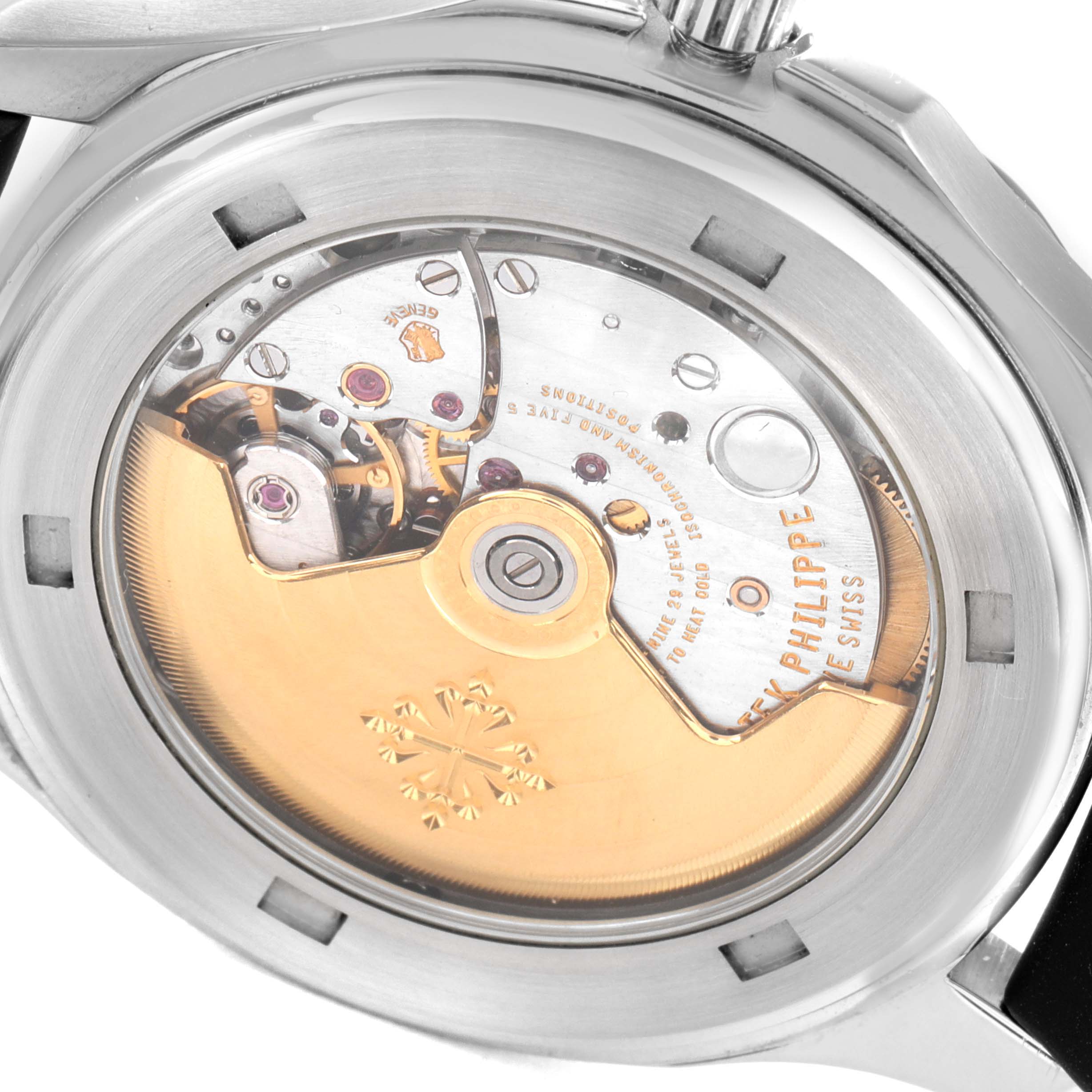 The image shows the back view of a Patek Philippe Aquanaut 5065/1A-010 Men's Stainless Steel Black Dial 5065/1A-010 Men's Stainless Steel Black Dial watch, highlighting the automatic movement and intricate mechanisms.