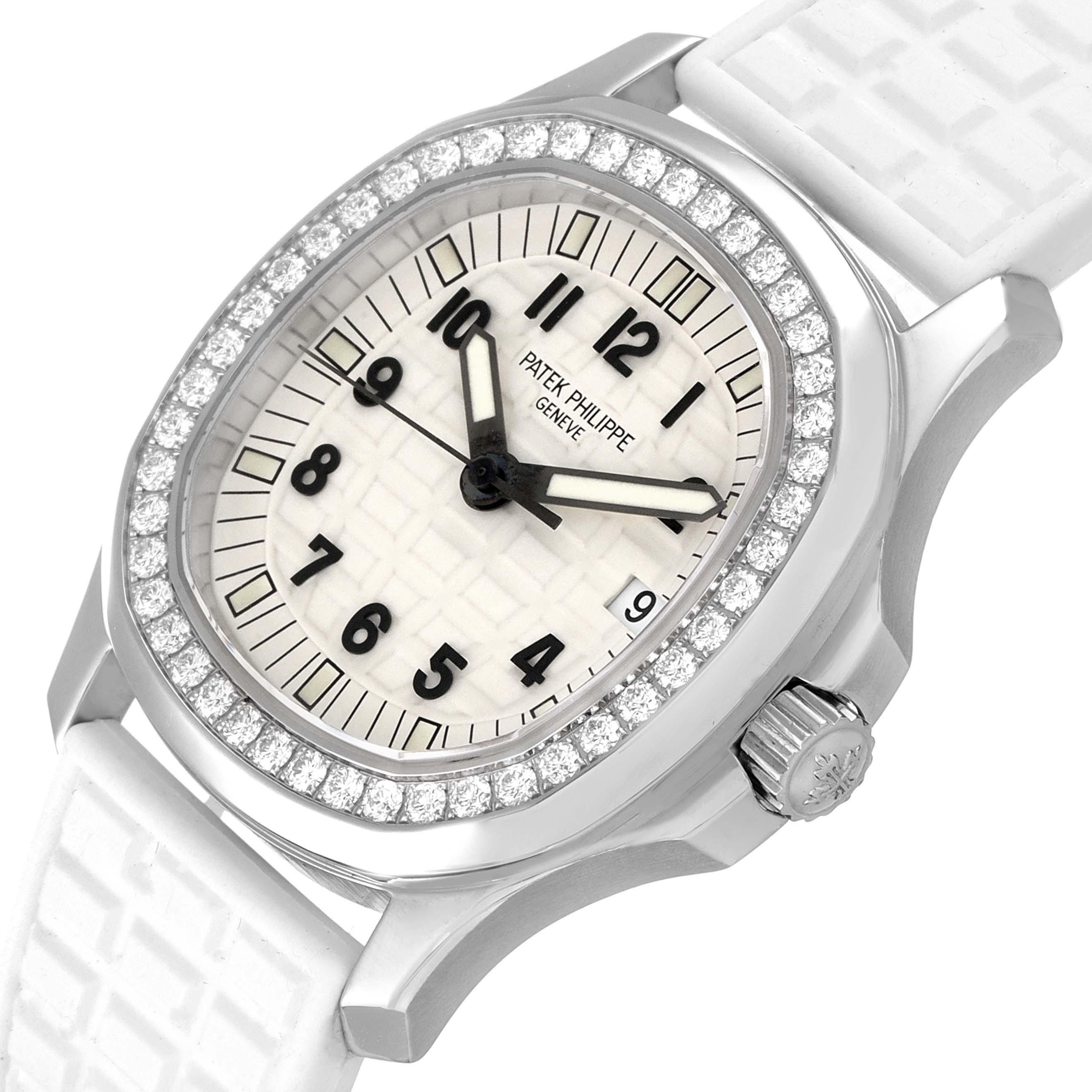This image shows a close-up angle of the Patek Philippe Aquanaut 5067A Women's Stainless Steel White Dial 5067A Women's Stainless Steel White Dial watch face, bezel, crown, and part of the strap.