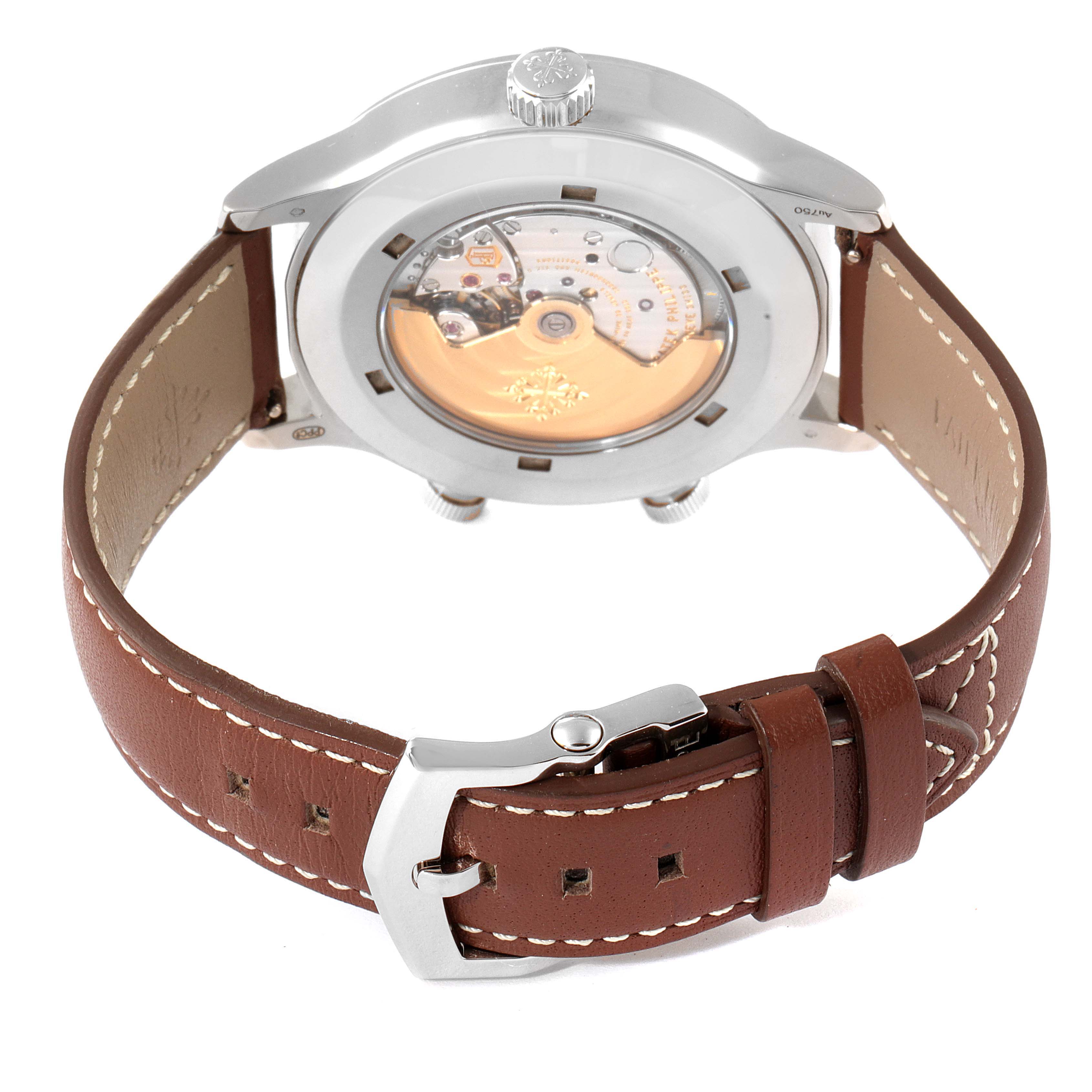 The image shows the back view of a Patek Philippe Calatrava 5524G Men's White Gold Blue Dial 5524G Men's White Gold Blue Dial watch, including the case back and leather strap.