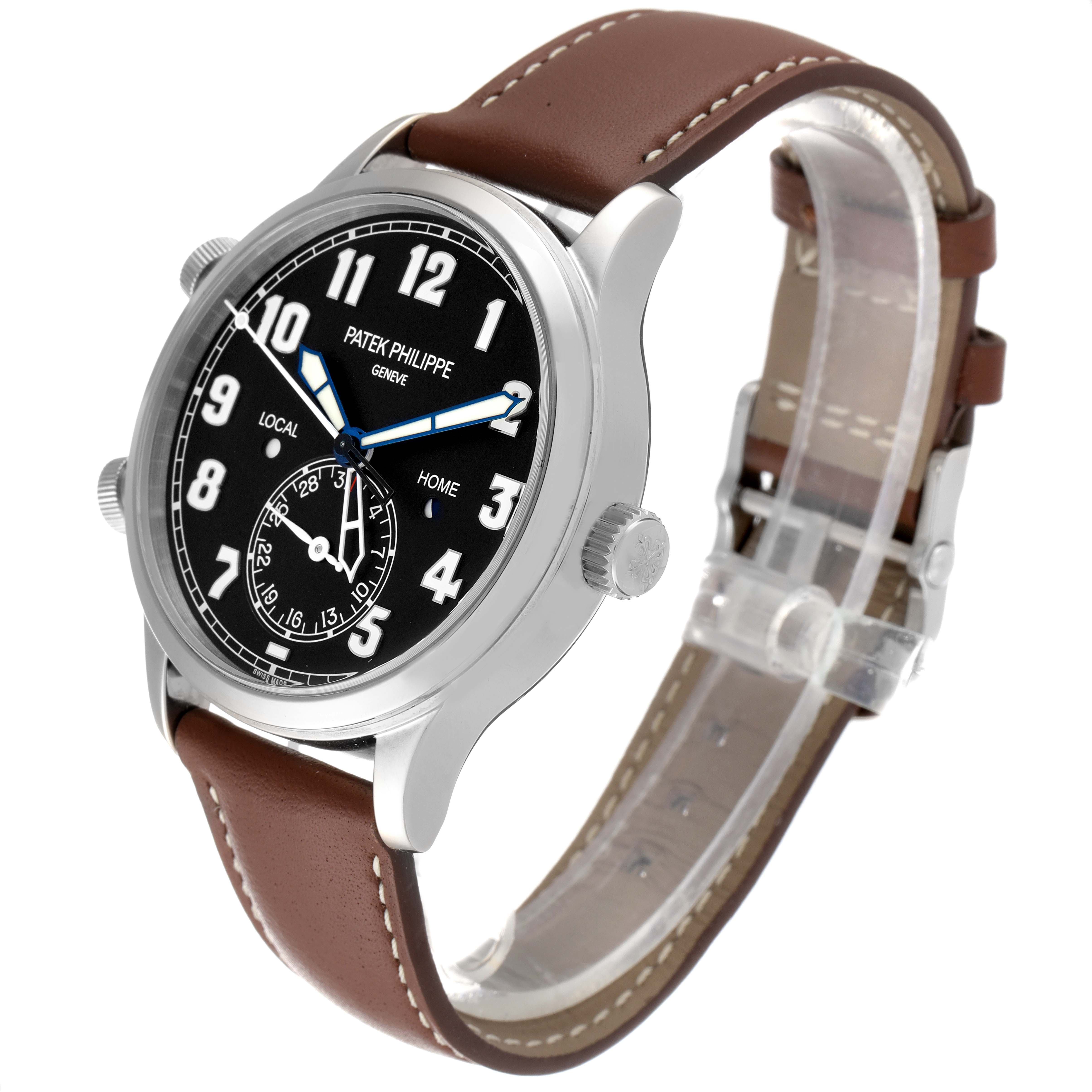 The image shows a Patek Philippe Calatrava 5524G Men's White Gold Blue Dial 5524G Men's White Gold Blue Dial watch at a three-quarter angle, featuring a black dial, brown leather strap, and three crowns.