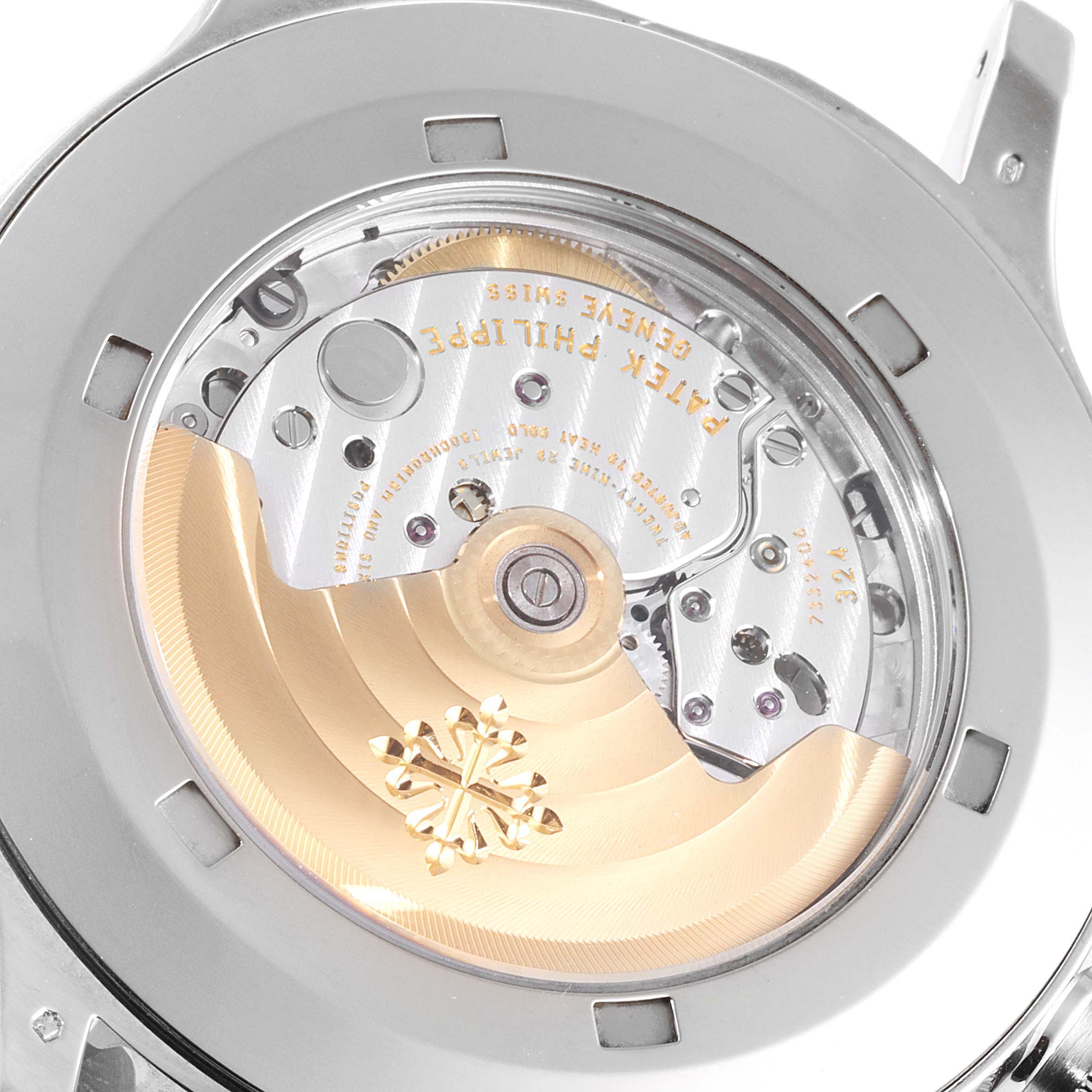 The image shows the back view of the Patek Philippe Calatrava 5524G Men's White Gold Blue Dial 5524G Men's White Gold Blue Dial watch, highlighting its intricate mechanical movement.