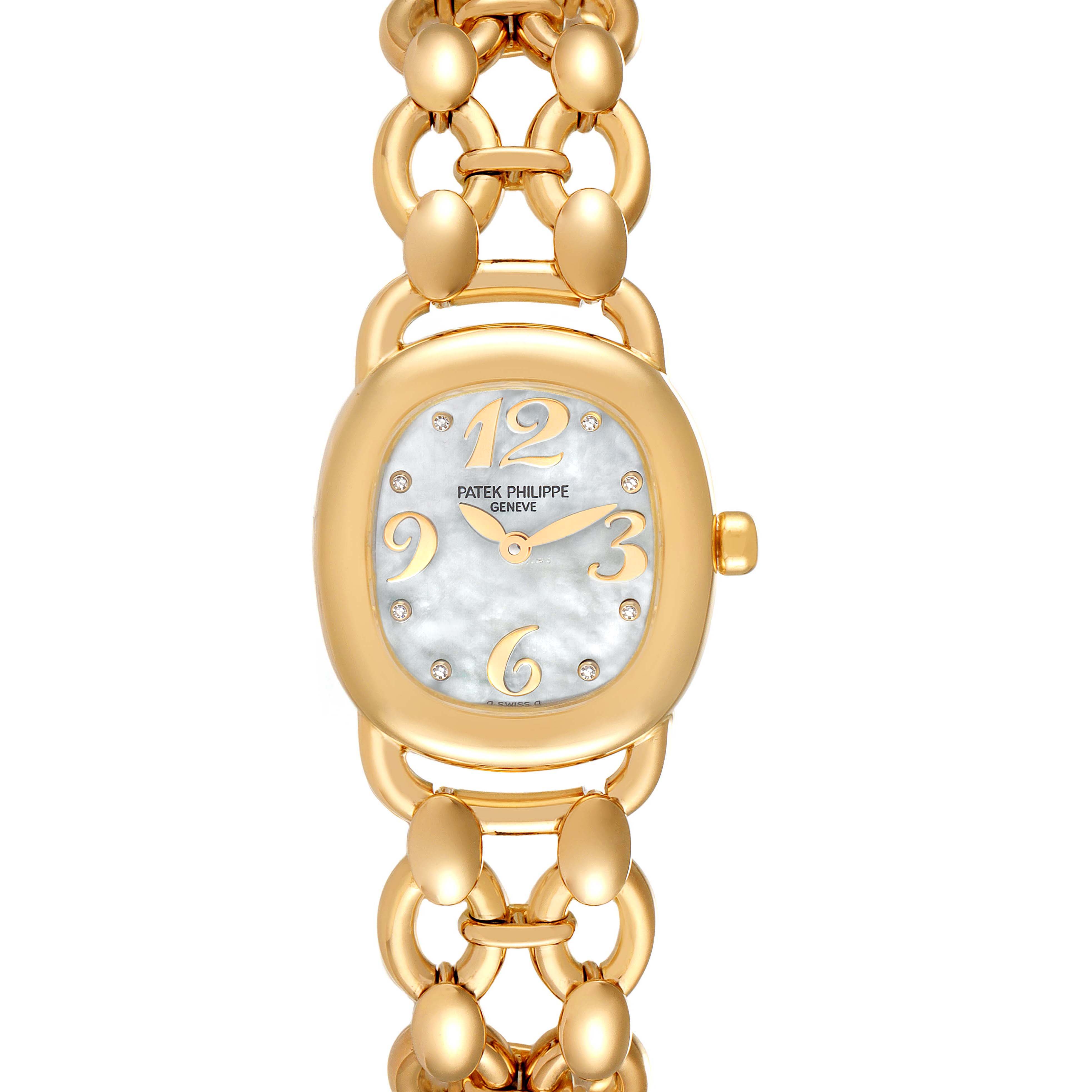 The image shows a Patek Philippe Golden Ellipse 4830J Women's Yellow Gold Mother of Pearl Dial 4830J Women's Yellow Gold Mother of Pearl Dial watch from a top-down angle, highlighting the dial, case, and a portion of the bracelet.