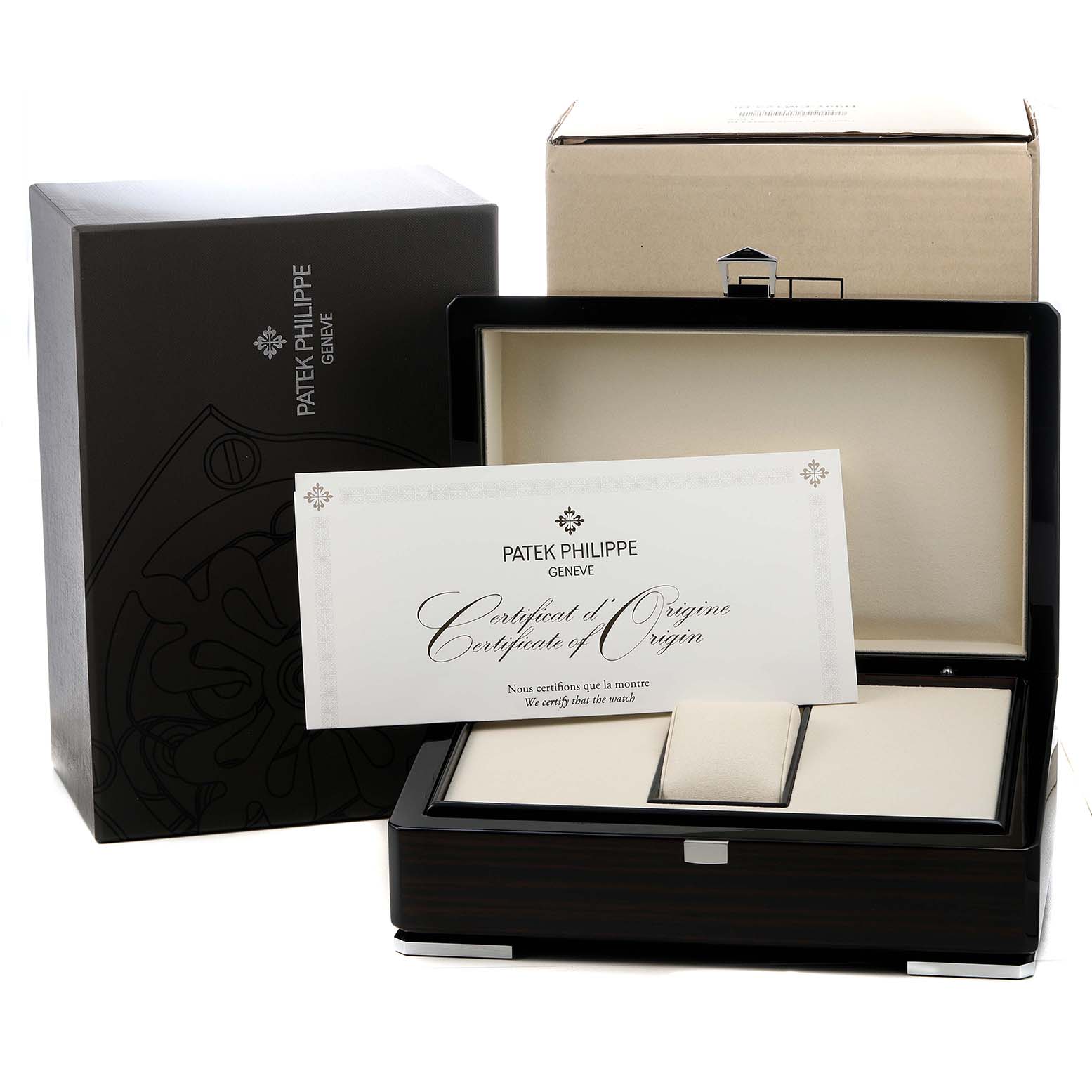 The image shows the packaging and certificate for a Patek Philippe Nautilus 5712G-001 Men's White Gold Grey Dial watch, including an open display box.