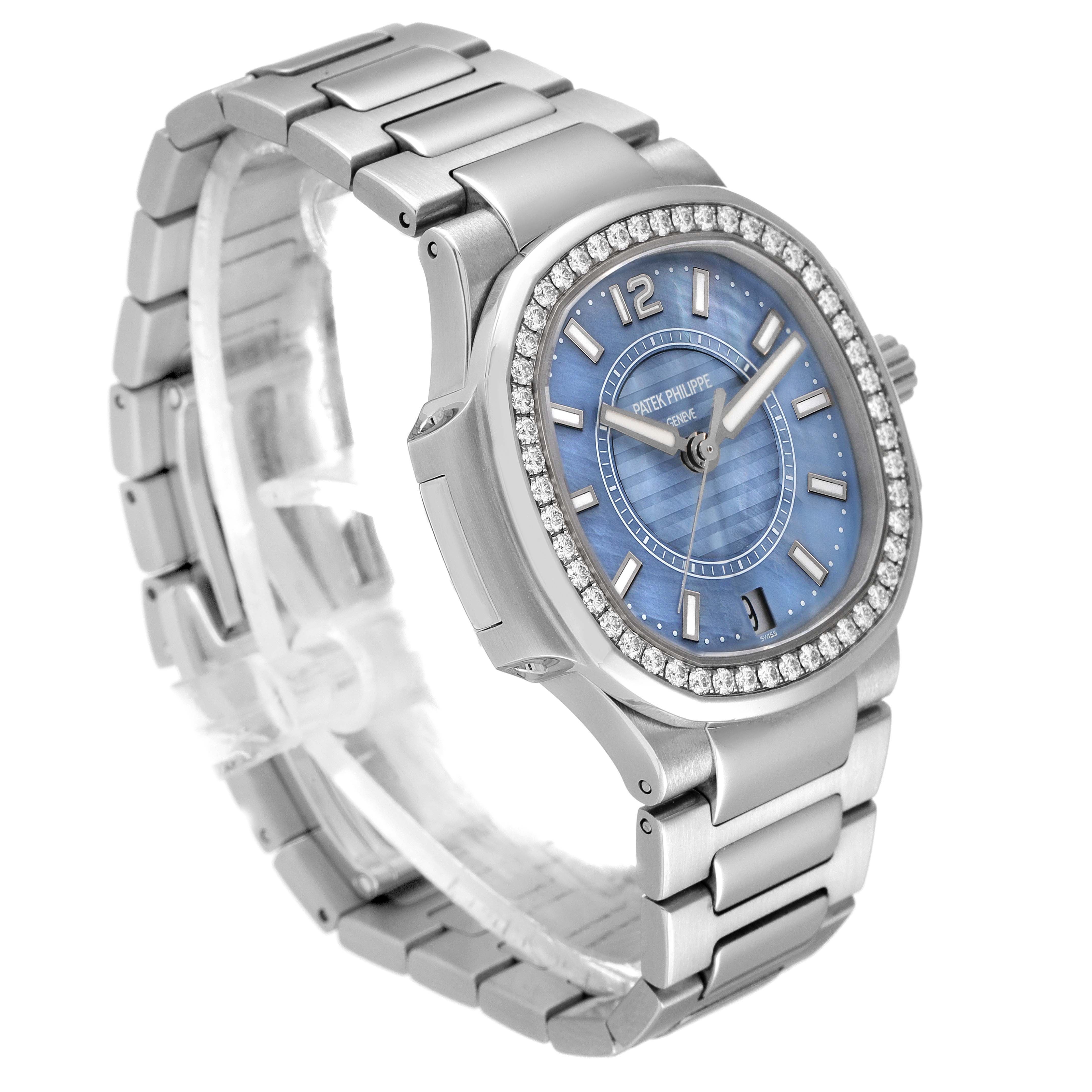 This image shows a side angle of the Patek Philippe Nautilus 7008/1A 001 Women's Stainless Steel Mother of Pearl Dial 7008/1A 001 Women's Stainless Steel Mother of Pearl Dial watch, highlighting its blue dial, diamond bezel, and stainless steel bracelet.