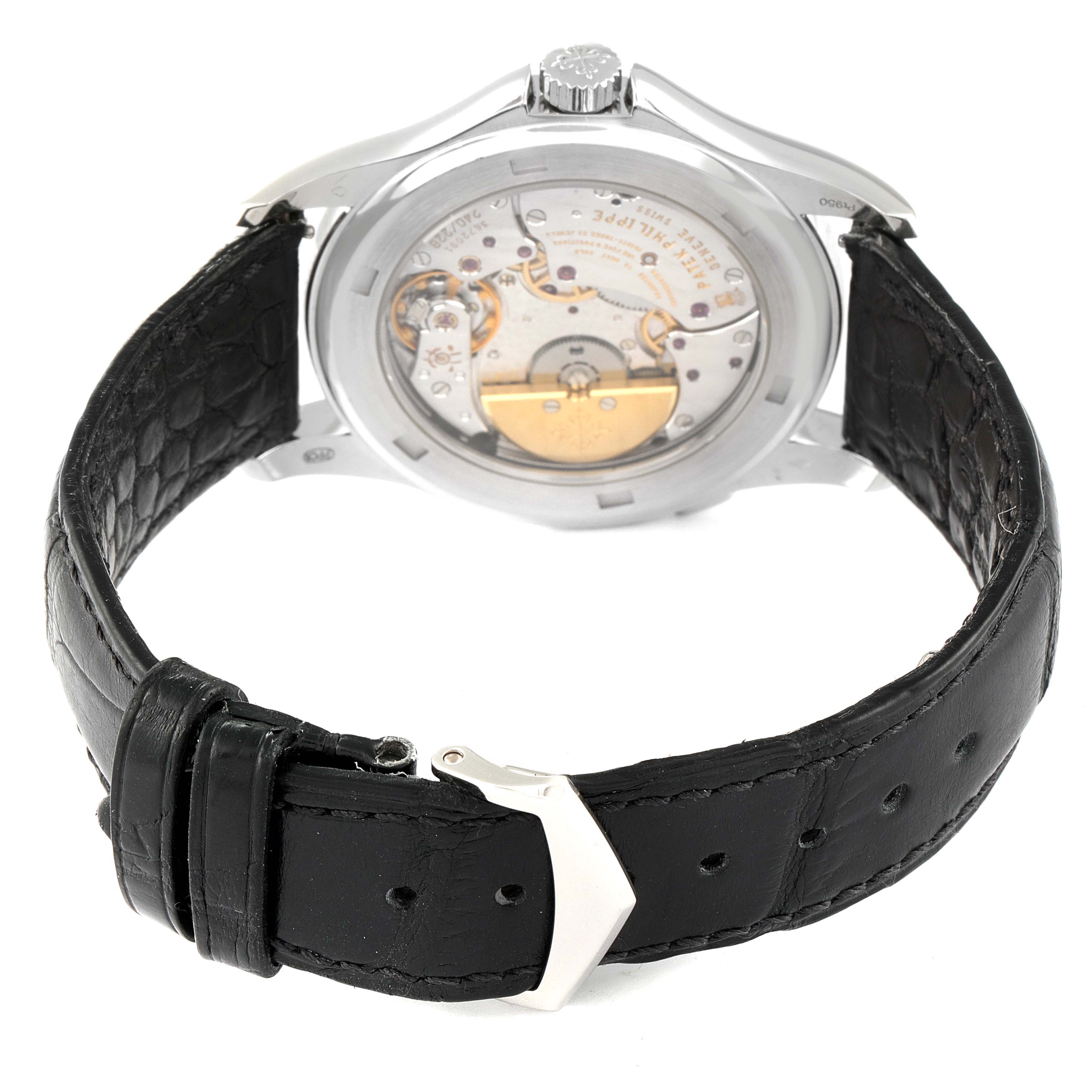 The image shows the back view of the Patek Philippe Complications 5130P Men's Platinum Silver Dial 5130P Men's Platinum Silver Dial model, focusing on its movement and black leather strap.