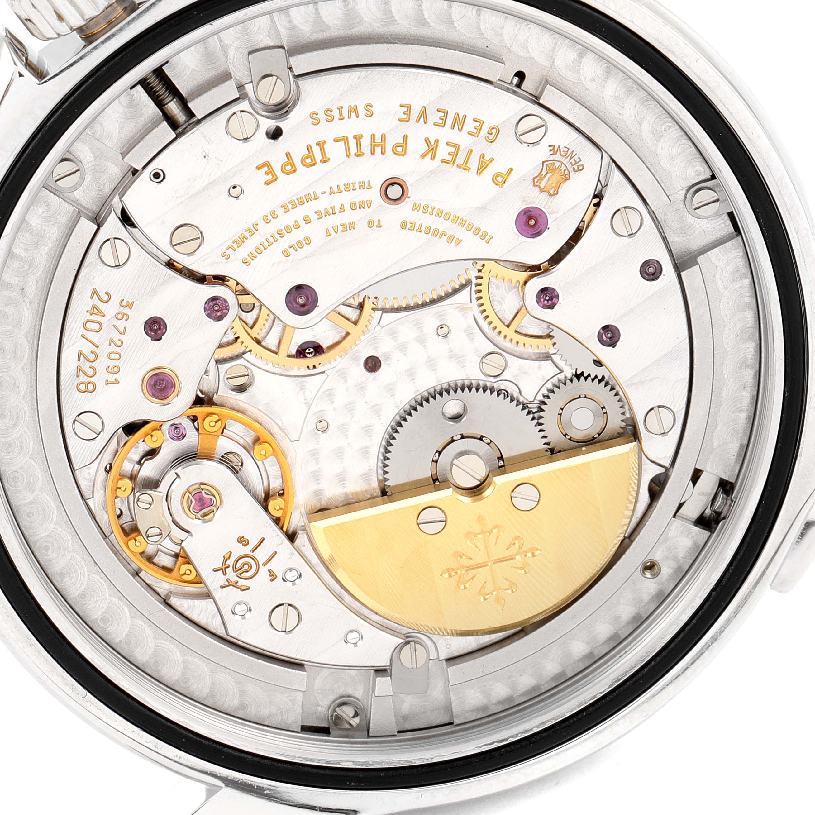 This image shows the intricate movement and internal mechanisms of a Patek Philippe Complications 5130P Men's Platinum Silver Dial 5130P Men's Platinum Silver Dial model watch from a rear, open case-back angle.