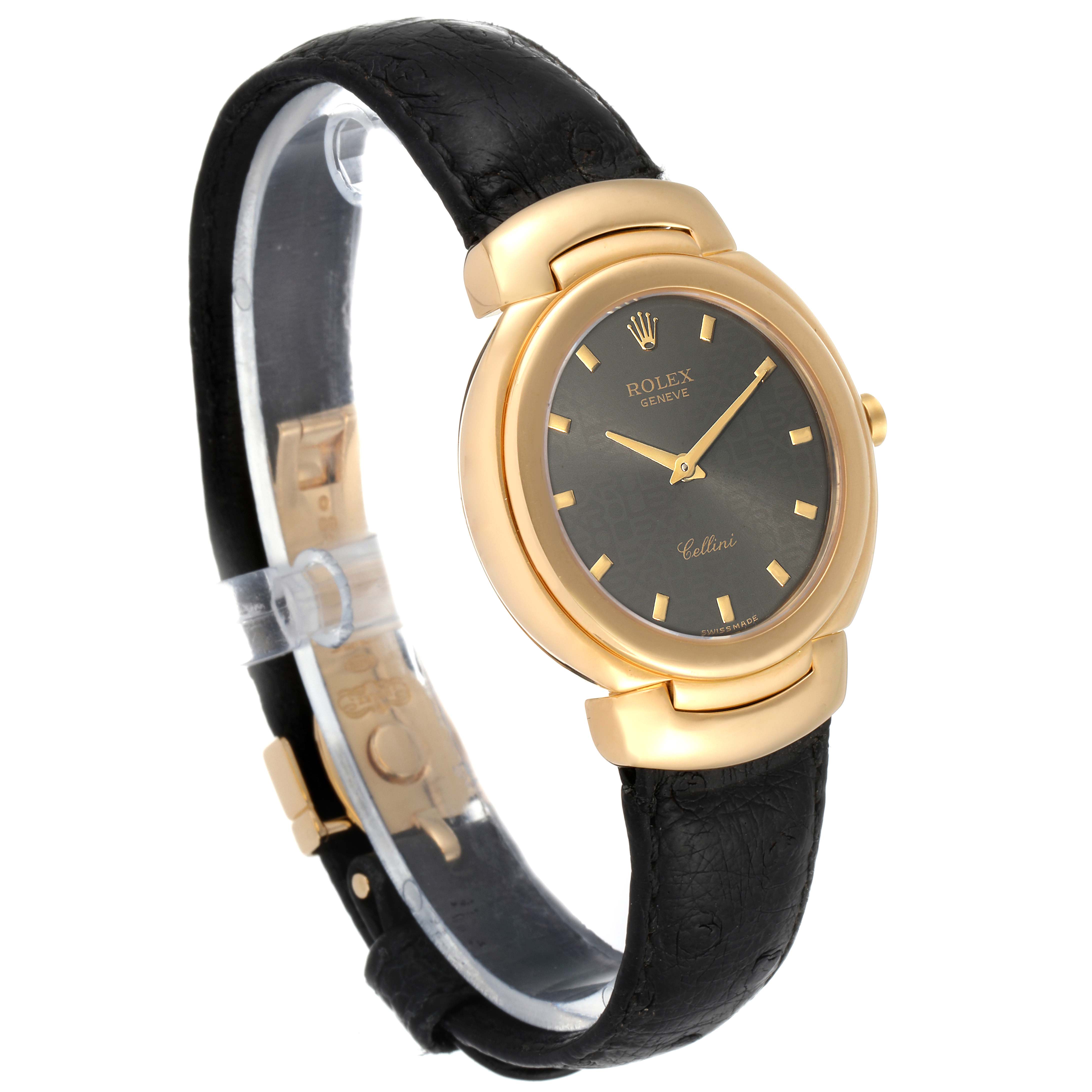 This image shows a side angle of the Rolex Cellini 6622 Men's Yellow Gold Grey Dial 6622 Men's Yellow Gold Grey Dial watch, highlighting its gold casing and black leather strap.