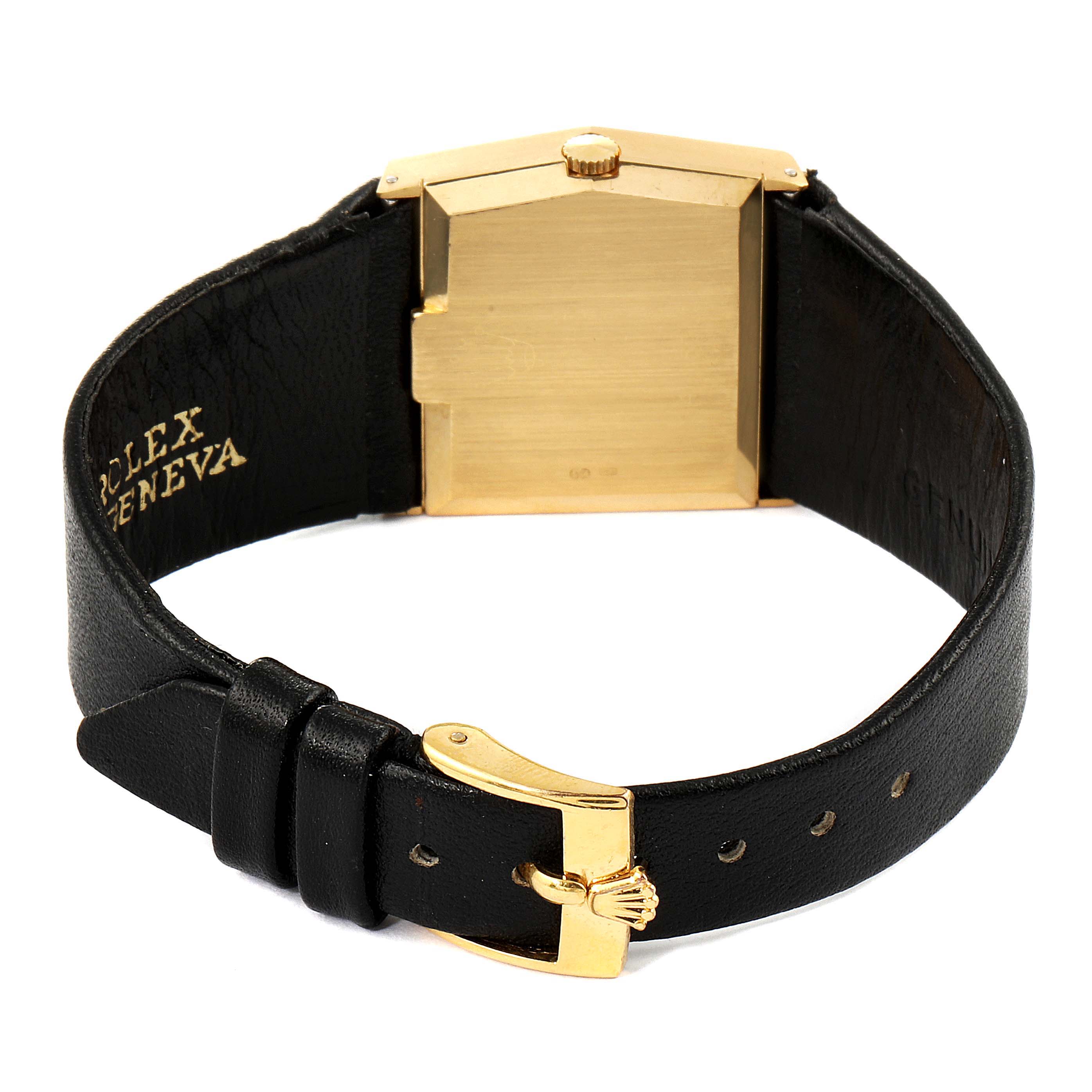 The image shows the back view of a Rolex Cellini 4017 Men's Yellow Gold Champagne Dial 4017 Men's Yellow Gold Champagne Dial watch, highlighting its gold clasp, case back, and black leather strap.